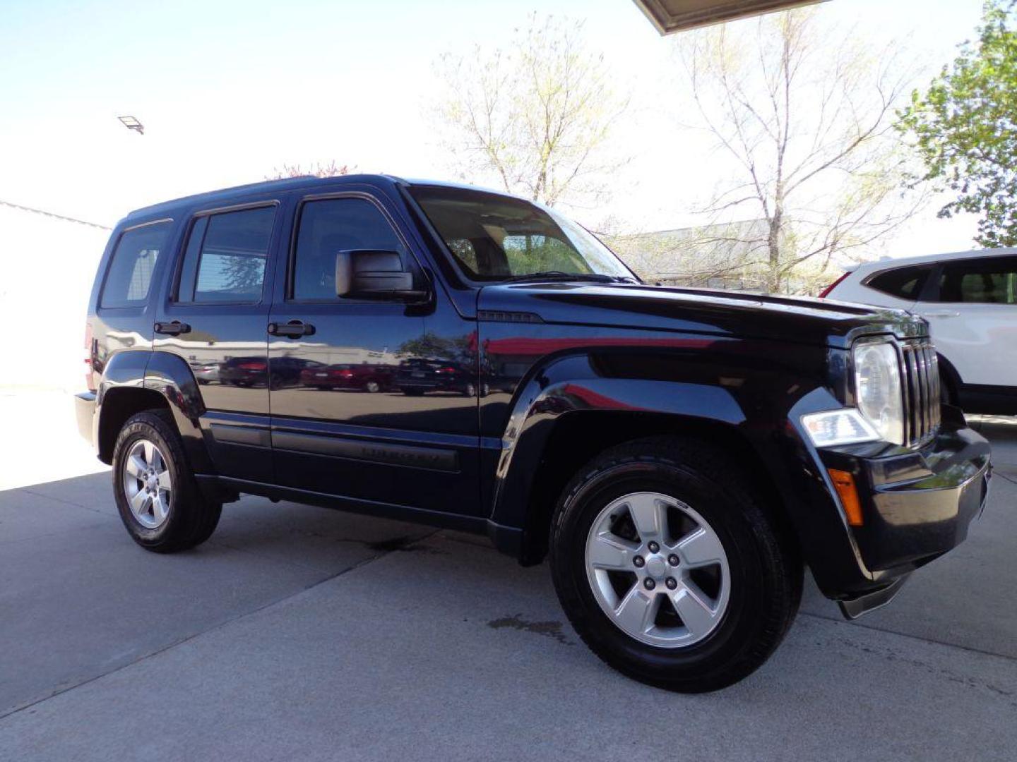 2011 BLUE JEEP LIBERTY SPORT (1J4PP2GK3BW) with an 3.7L engine, Automatic transmission, located at 6610 L St., Omaha, NE, 68117, (402) 731-7800, 41.212872, -96.014702 - Photo#2