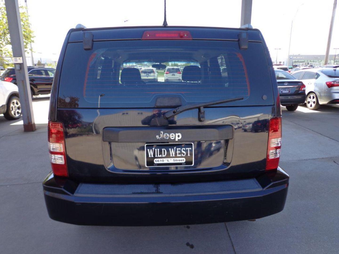 2011 BLUE JEEP LIBERTY SPORT (1J4PP2GK3BW) with an 3.7L engine, Automatic transmission, located at 6610 L St., Omaha, NE, 68117, (402) 731-7800, 41.212872, -96.014702 - Photo#4