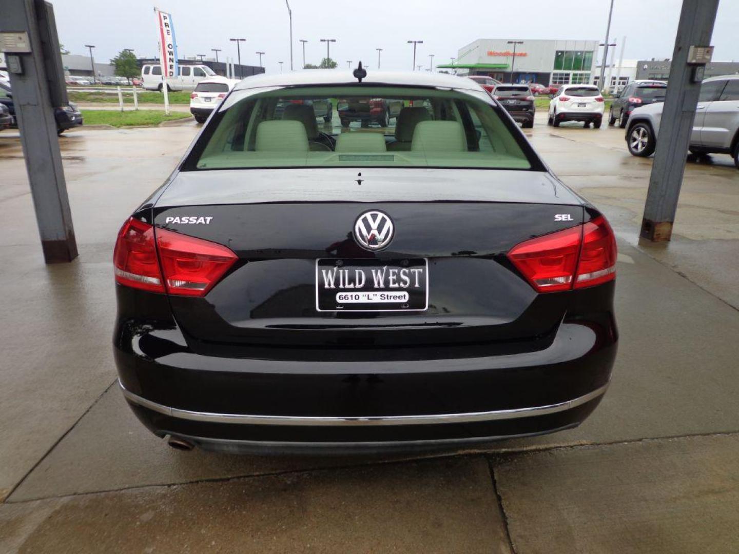 2013 BLACK VOLKSWAGEN PASSAT SEL (1VWCH7A34DC) with an 2.5L engine, Automatic transmission, located at 6610 L St., Omaha, NE, 68117, (402) 731-7800, 41.212872, -96.014702 - SHARP SEL PACKAGE WITH A CLEAN CARFAX, LOW MILEAGE, SUNROOF, HEATED SEATS, BACKUP CAM AND NEWER TIRES! *****We have found that most customers do the majority of their shopping online before visiting a dealership. For this reason we feel it necessary to have a competitive price on our used vehi - Photo#4