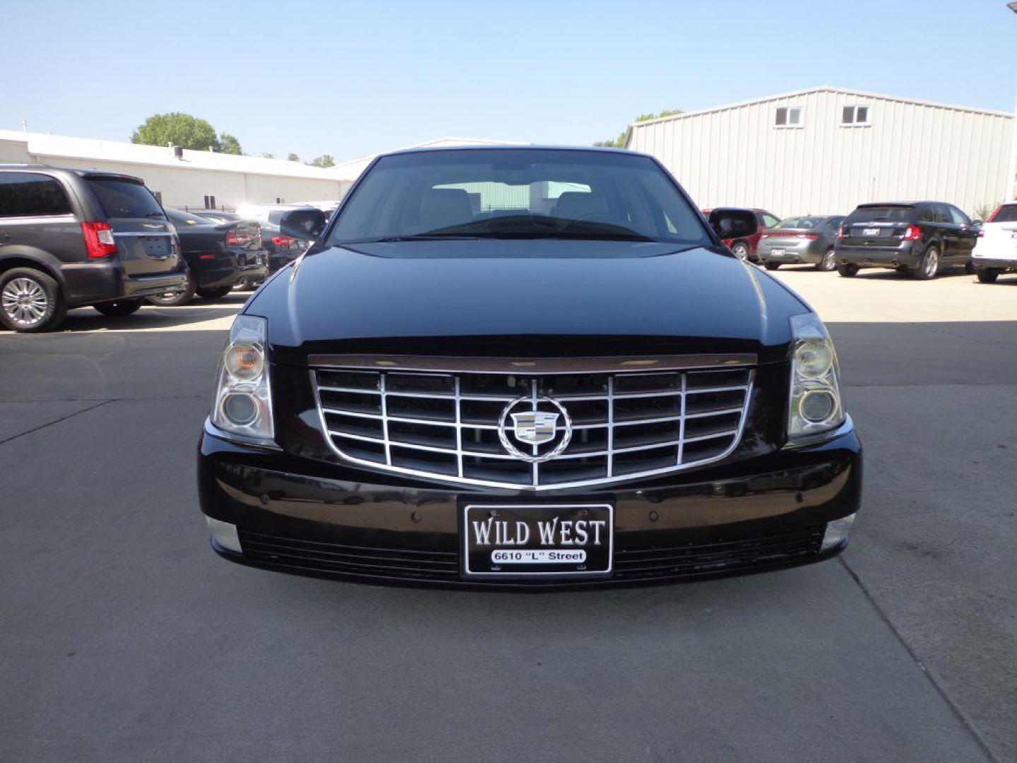 2009 BROWN CADILLAC DTS (1G6KD57Y39U) with an 4.6L engine, Automatic transmission, located at 6610 L St., Omaha, NE, 68117, (402) 731-7800, 41.212872, -96.014702 - SHARP LOOKING TRADE-IN RUNS AND DRIVES WELL WITH NAV, PARK ASSIST, SUNROOF AND NEWER TIRES! *****We have found that most customers do the majority of their shopping online before visiting a dealership. For this reason we feel it necessary to have a competitive price on our used vehicles right - Photo#1