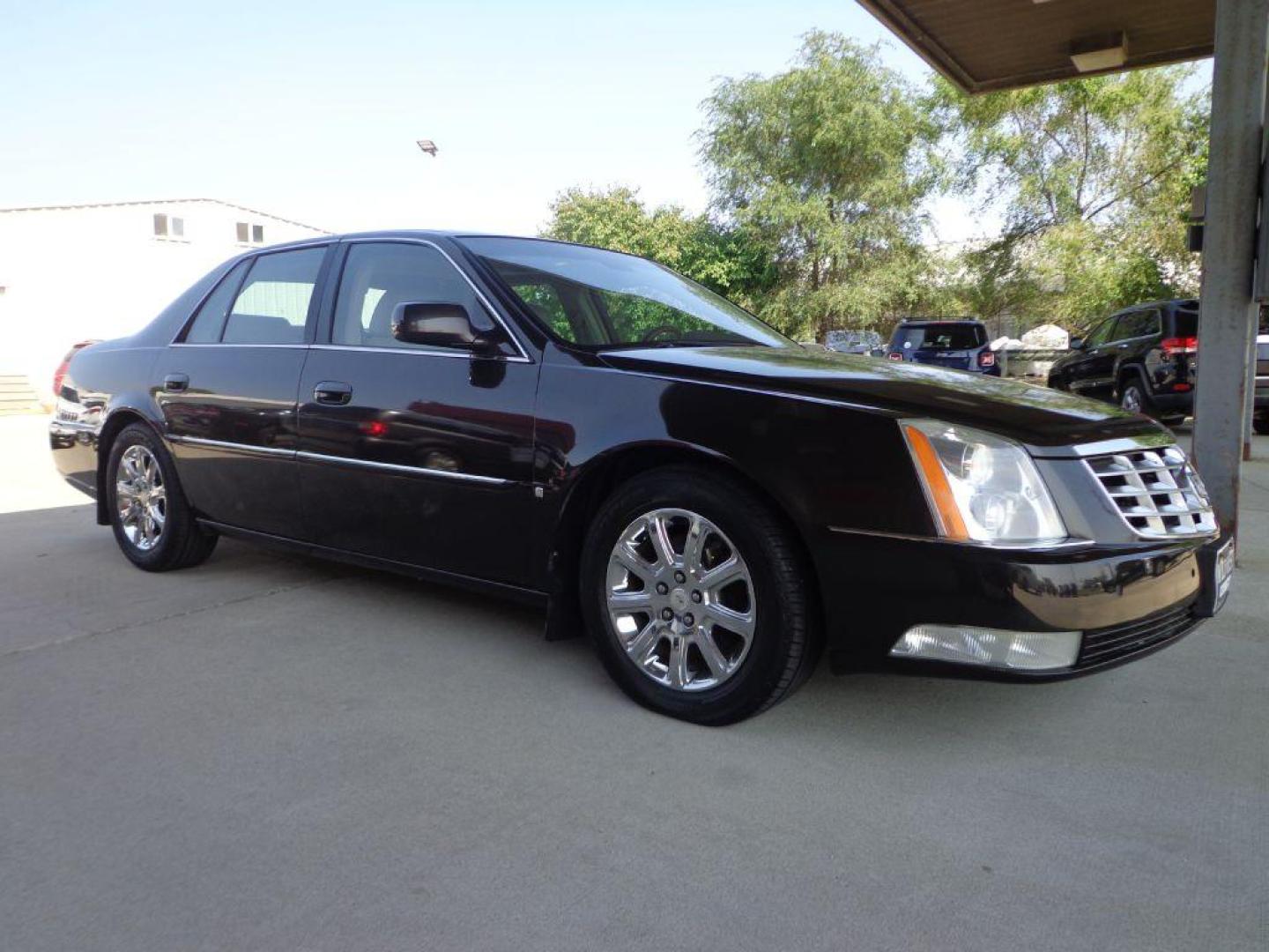 2009 BROWN CADILLAC DTS (1G6KD57Y39U) with an 4.6L engine, Automatic transmission, located at 6610 L St., Omaha, NE, 68117, (402) 731-7800, 41.212872, -96.014702 - SHARP LOOKING TRADE-IN RUNS AND DRIVES WELL WITH NAV, PARK ASSIST, SUNROOF AND NEWER TIRES! *****We have found that most customers do the majority of their shopping online before visiting a dealership. For this reason we feel it necessary to have a competitive price on our used vehicles right - Photo#2