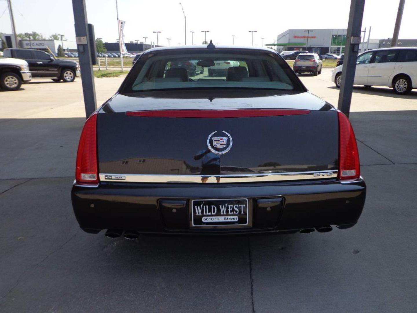 2009 BROWN CADILLAC DTS (1G6KD57Y39U) with an 4.6L engine, Automatic transmission, located at 6610 L St., Omaha, NE, 68117, (402) 731-7800, 41.212872, -96.014702 - SHARP LOOKING TRADE-IN RUNS AND DRIVES WELL WITH NAV, PARK ASSIST, SUNROOF AND NEWER TIRES! *****We have found that most customers do the majority of their shopping online before visiting a dealership. For this reason we feel it necessary to have a competitive price on our used vehicles right - Photo#4