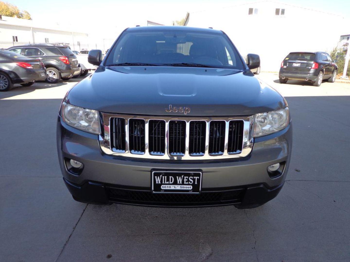 2012 GRAY JEEP GRAND CHEROKEE LAREDO (1C4RJFAG7CC) with an 3.6L engine, Automatic transmission, located at 6610 L St., Omaha, NE, 68117, (402) 731-7800, 41.212872, -96.014702 - 2-OWNER CLEAN CARFAX LOW MILEAGE LOADED WITH HEATED LEATHER, SUNROOF, NAV AND BACKUP CAM! *****We have found that most customers do the majority of their shopping online before visiting a dealership. For this reason we feel it necessary to have a competitive price on our used vehicles right up - Photo#1