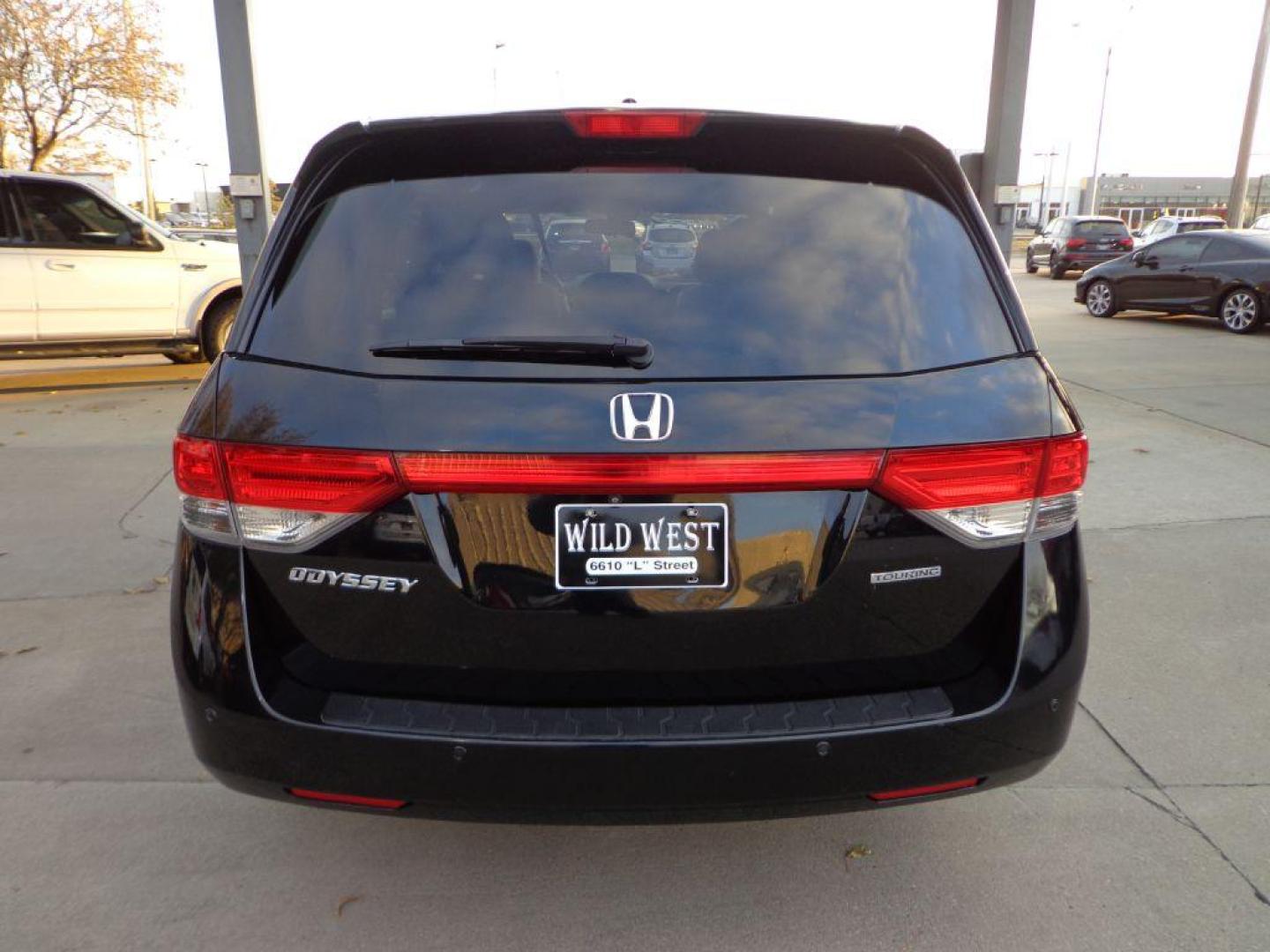 2014 BLACK HONDA ODYSSEY TOURING (5FNRL5H90EB) with an 3.5L engine, Automatic transmission, located at 6610 L St., Omaha, NE, 68117, (402) 731-7800, 41.212872, -96.014702 - Photo#3