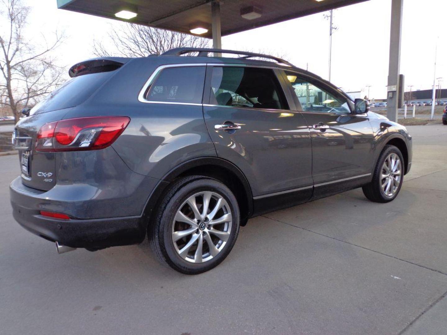 2014 GRAY MAZDA CX-9 GRAND TOURING (JM3TB3DV8E0) with an 3.7L engine, Automatic transmission, located at 6610 L St., Omaha, NE, 68117, (402) 731-7800, 41.212872, -96.014702 - 1-OWNER CLEAN CARFAX LOW MILEAGE LOADED WITH HEATED SEATS, 3RD ROW, SUNROOF, NAV, BACKUP CAM, BOSE AND MUCH MORE! *****We have found that most customers do the majority of their shopping online before visiting a dealership. For this reason we feel it necessary to have a competitive price on o - Photo#3