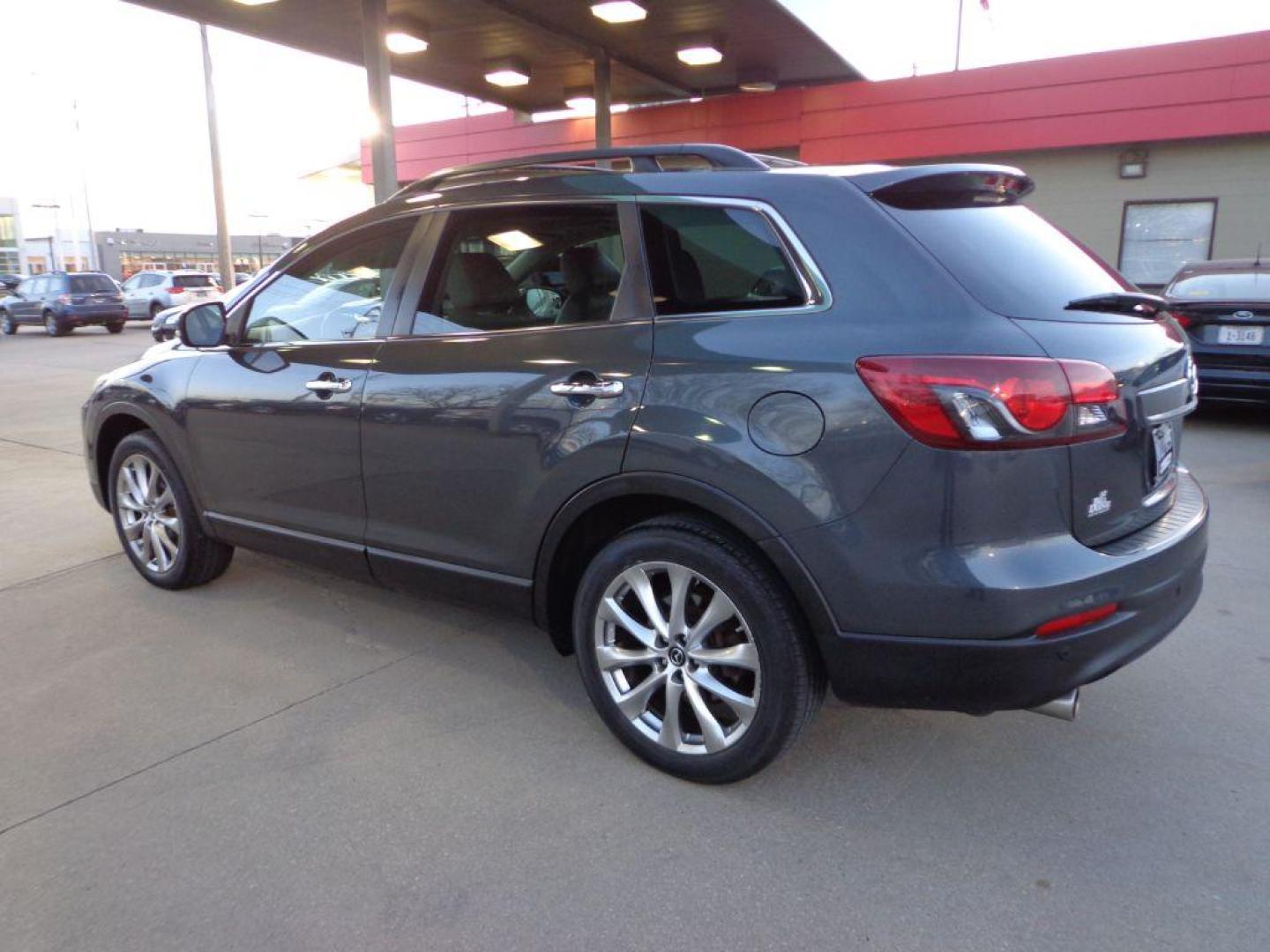 2014 GRAY MAZDA CX-9 GRAND TOURING (JM3TB3DV8E0) with an 3.7L engine, Automatic transmission, located at 6610 L St., Omaha, NE, 68117, (402) 731-7800, 41.212872, -96.014702 - 1-OWNER CLEAN CARFAX LOW MILEAGE LOADED WITH HEATED SEATS, 3RD ROW, SUNROOF, NAV, BACKUP CAM, BOSE AND MUCH MORE! *****We have found that most customers do the majority of their shopping online before visiting a dealership. For this reason we feel it necessary to have a competitive price on o - Photo#5