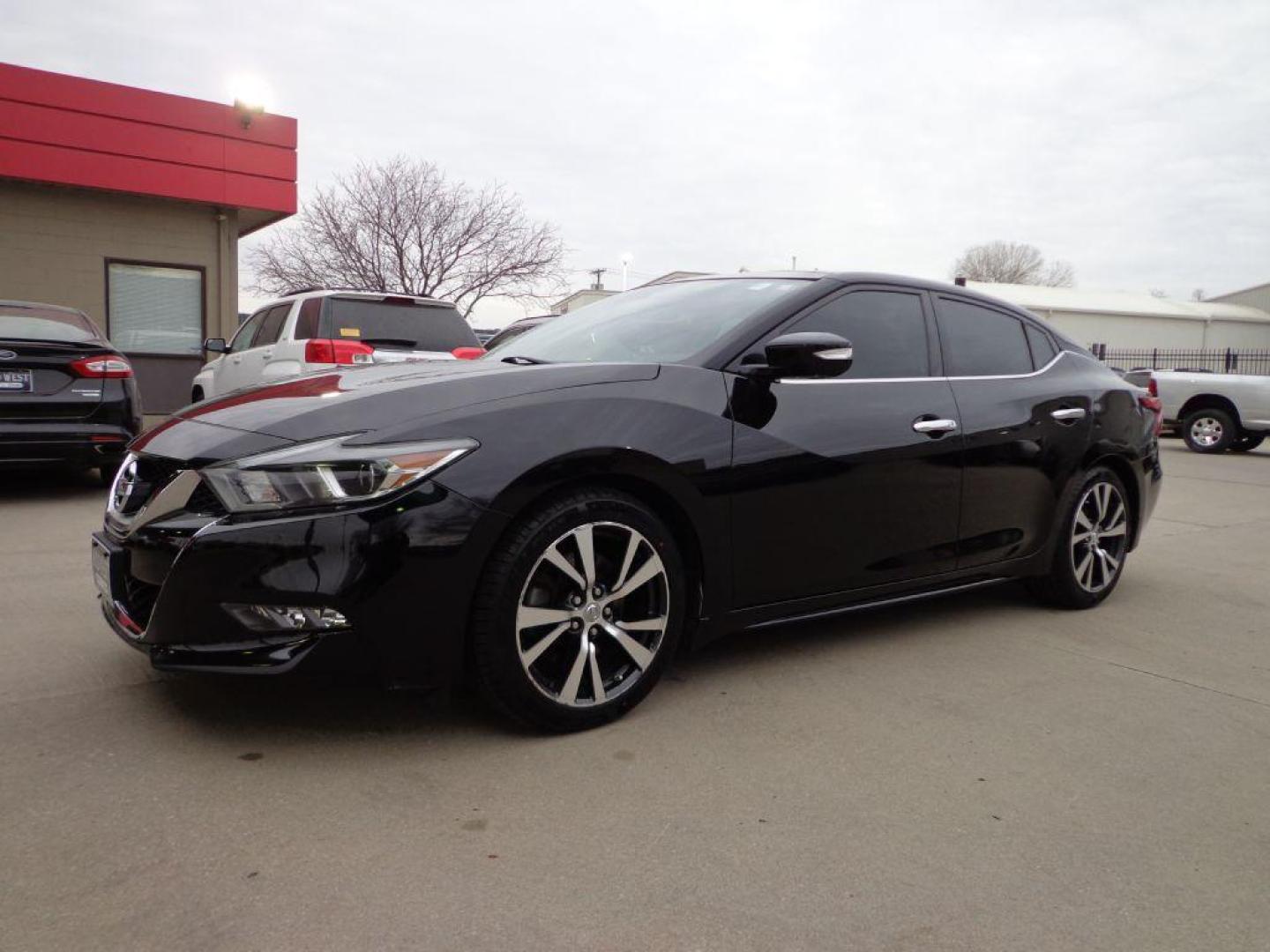 2017 BLACK NISSAN MAXIMA SL (1N4AA6AP1HC) with an 3.5L engine, Continuously Variable transmission, located at 6610 L St., Omaha, NE, 68117, (402) 731-7800, 41.212872, -96.014702 - Photo#0