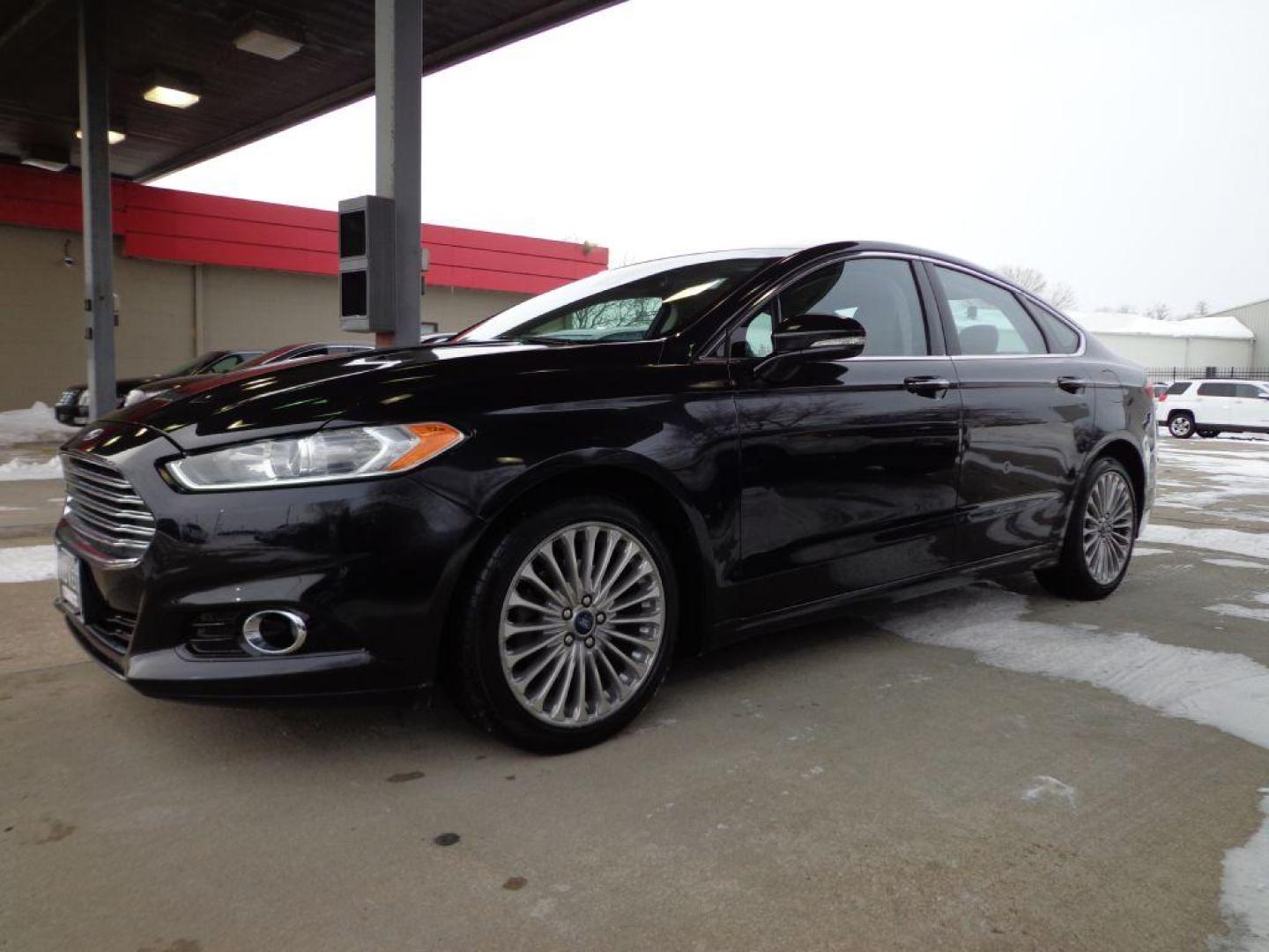 2015 BLACK FORD FUSION TITANIUM (3FA6P0K92FR) with an 2.0L engine, Automatic transmission, located at 6610 L St., Omaha, NE, 68117, (402) 731-7800, 41.212872, -96.014702 - Photo#0