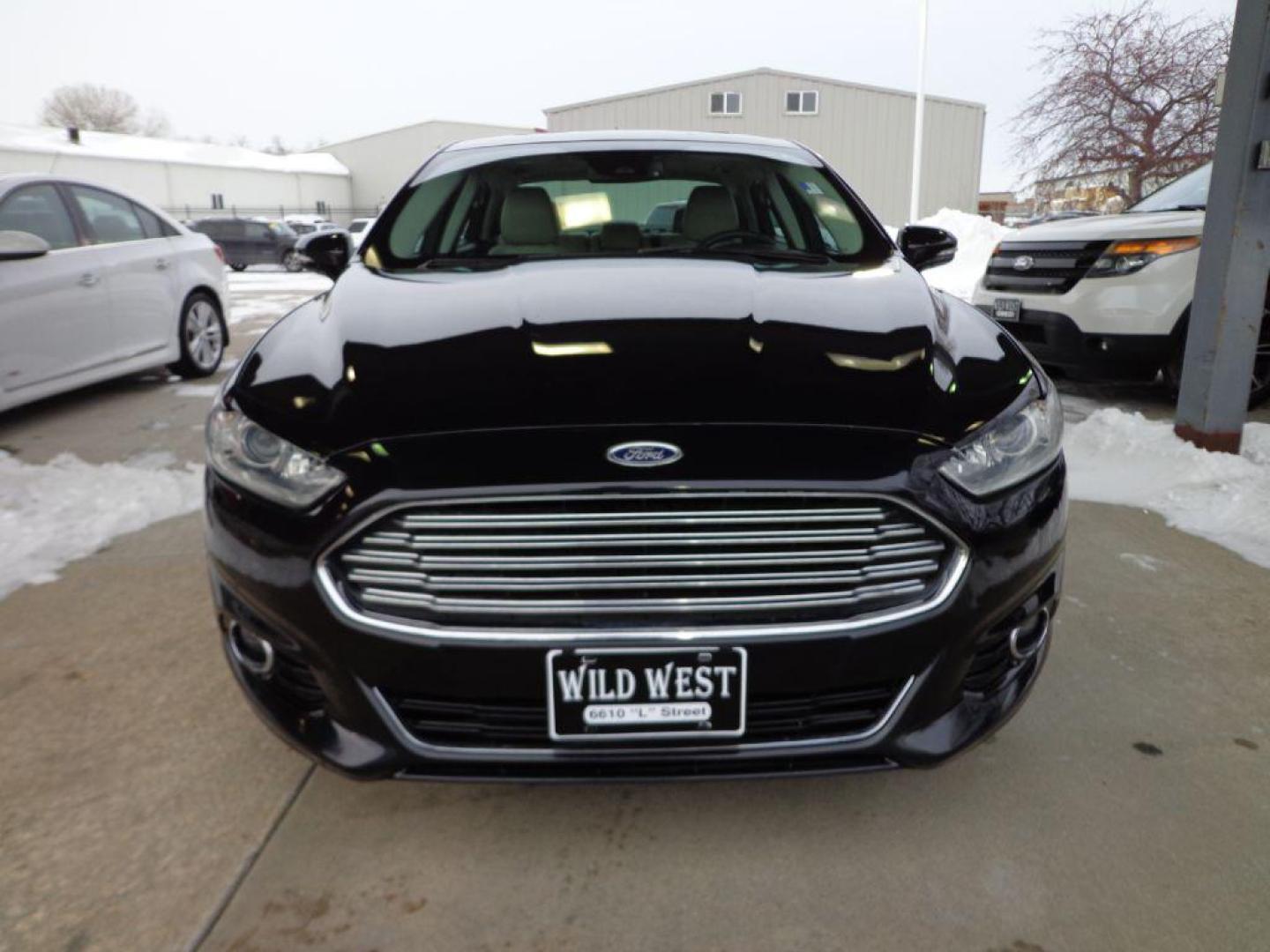 2015 BLACK FORD FUSION TITANIUM (3FA6P0K92FR) with an 2.0L engine, Automatic transmission, located at 6610 L St., Omaha, NE, 68117, (402) 731-7800, 41.212872, -96.014702 - Photo#1