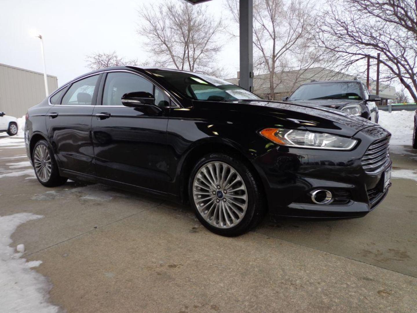 2015 BLACK FORD FUSION TITANIUM (3FA6P0K92FR) with an 2.0L engine, Automatic transmission, located at 6610 L St., Omaha, NE, 68117, (402) 731-7800, 41.212872, -96.014702 - Photo#2