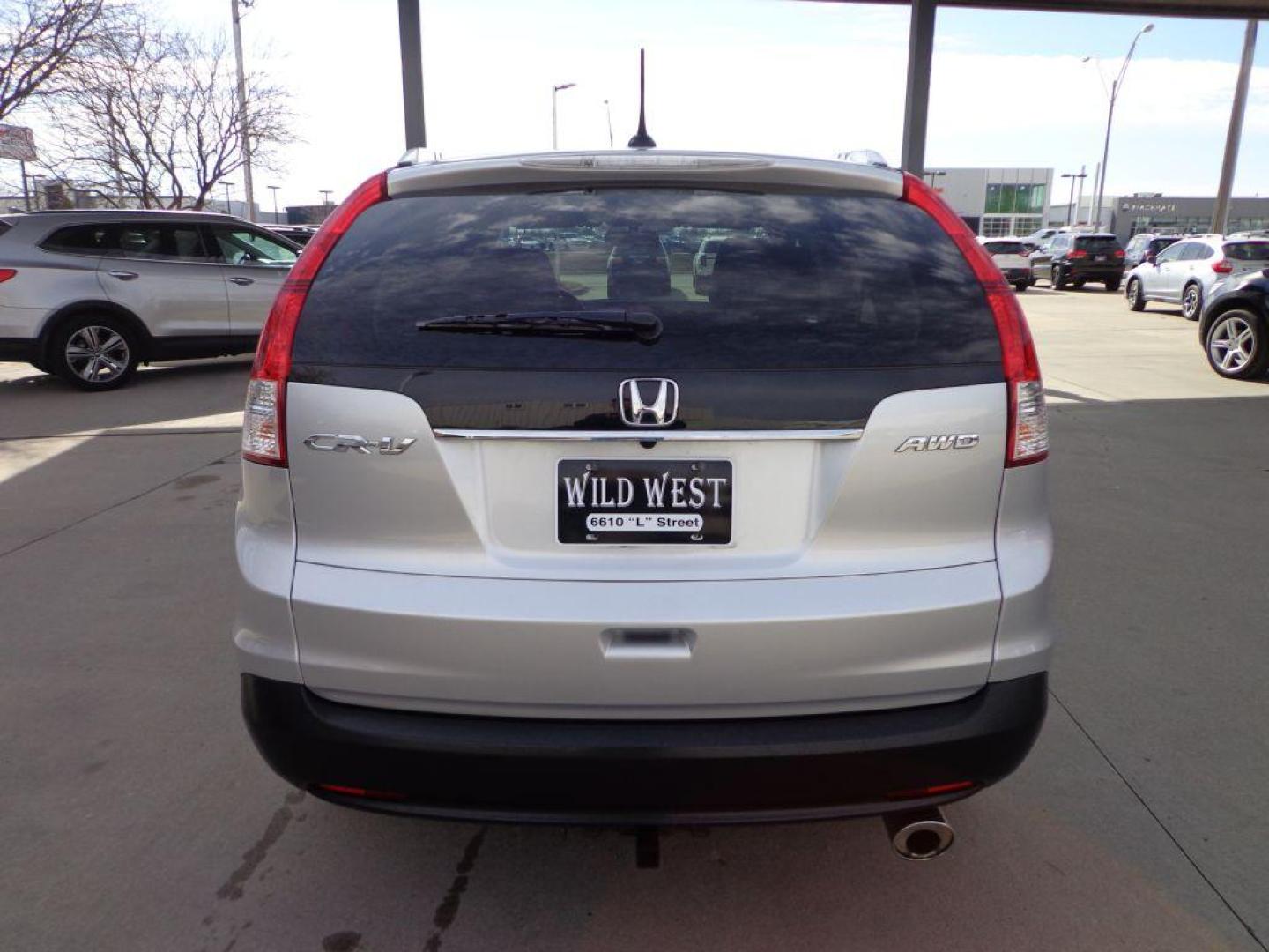 2013 SILVER HONDA CR-V EXL (2HKRM4H71DH) with an 2.4L engine, Automatic transmission, located at 6610 L St., Omaha, NE, 68117, (402) 731-7800, 41.212872, -96.014702 - 1-OWNER CLEAN CARFAX LOW MILEAGE WITH NEWER TIRES! *****We have found that most customers do the majority of their shopping online before visiting a dealership. For this reason we feel it necessary to have a competitive price on our used vehicles right up front. We spend time researching the - Photo#4