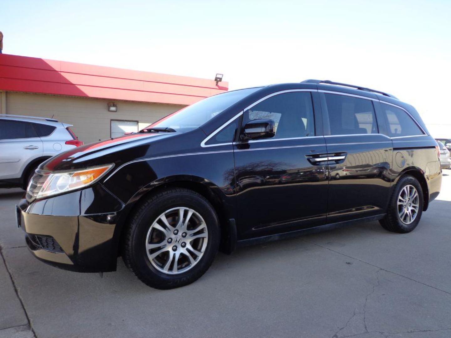 2013 BLACK HONDA ODYSSEY EXL (5FNRL5H66DB) with an 3.5L engine, Automatic transmission, located at 6610 L St., Omaha, NE, 68117, (402) 731-7800, 41.212872, -96.014702 - Photo#0