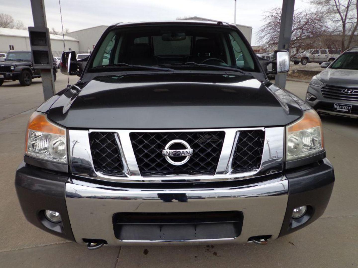 2011 GRAY NISSAN TITAN SL (1N6AA0EC5BN) with an 5.6L engine, Automatic transmission, located at 6610 L St., Omaha, NE, 68117, (402) 731-7800, 41.212872, -96.014702 - 2-OWNER CLEAN CARFAX RUST-FREE LOW MILE SL PACKAGE WITH HEATED LEATHER, SUNROOF, REAR ENTERTAINMENT, NAV AND NEWER TIRES! *****We have found that most customers do the majority of their shopping online before visiting a dealership. For this reason we feel it necessary to have a competitive pr - Photo#1