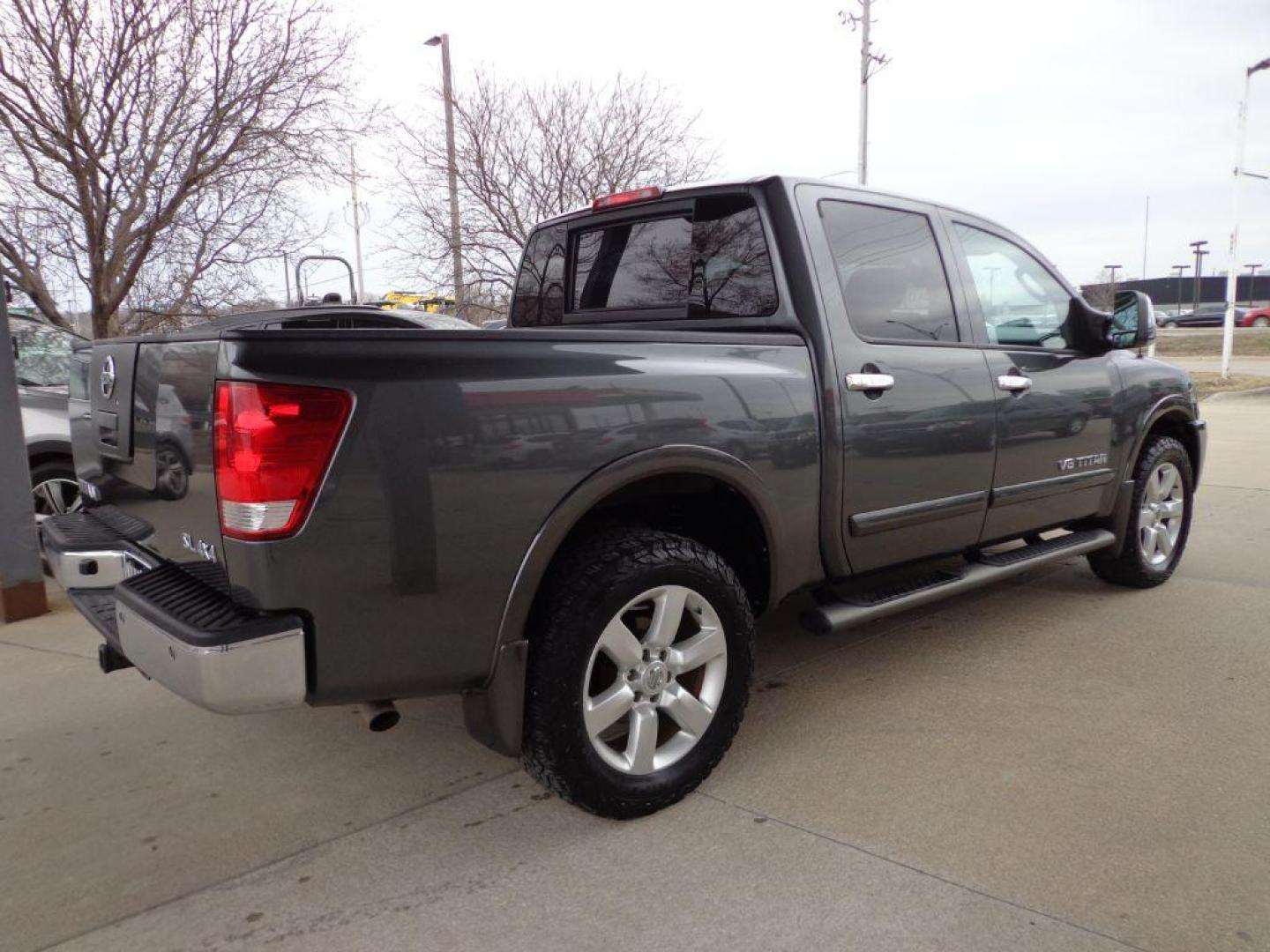 2011 GRAY NISSAN TITAN SL (1N6AA0EC5BN) with an 5.6L engine, Automatic transmission, located at 6610 L St., Omaha, NE, 68117, (402) 731-7800, 41.212872, -96.014702 - 2-OWNER CLEAN CARFAX RUST-FREE LOW MILE SL PACKAGE WITH HEATED LEATHER, SUNROOF, REAR ENTERTAINMENT, NAV AND NEWER TIRES! *****We have found that most customers do the majority of their shopping online before visiting a dealership. For this reason we feel it necessary to have a competitive pr - Photo#3