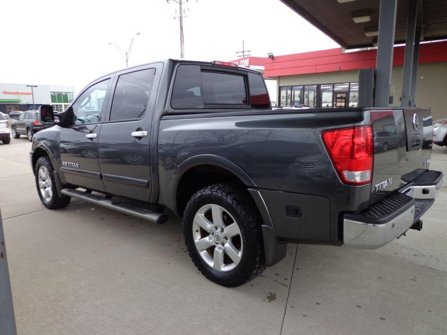 2011 GRAY NISSAN TITAN SL (1N6AA0EC5BN) with an 5.6L engine, Automatic transmission, located at 6610 L St., Omaha, NE, 68117, (402) 731-7800, 41.212872, -96.014702 - 2-OWNER CLEAN CARFAX RUST-FREE LOW MILE SL PACKAGE WITH HEATED LEATHER, SUNROOF, REAR ENTERTAINMENT, NAV AND NEWER TIRES! *****We have found that most customers do the majority of their shopping online before visiting a dealership. For this reason we feel it necessary to have a competitive pr - Photo#5