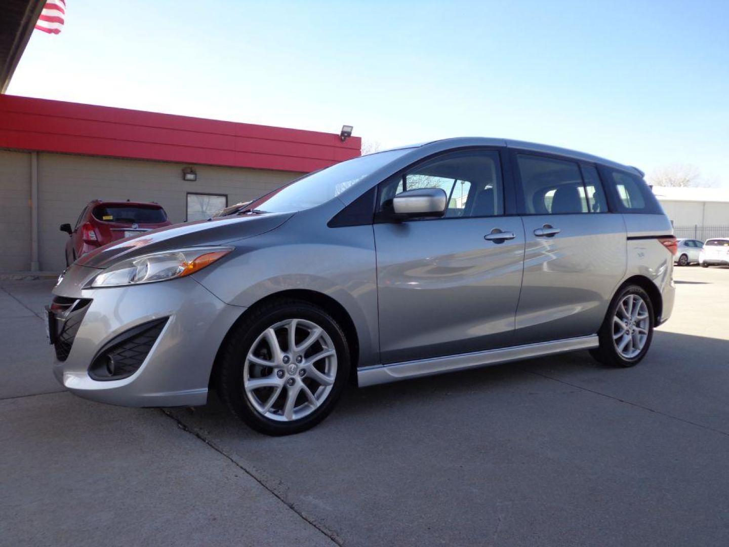 2012 SILVER MAZDA 5 GRAND TOURING (JM1CW2DL4C0) with an 2.5L engine, Automatic transmission, located at 6610 L St., Omaha, NE, 68117, (402) 731-7800, 41.212872, -96.014702 - GRAND TOURING MODEL WITH LOW MILEAGE, CLEAN CARFAX, HEATED LEATHER, 3RD ROW SEATING, SUNROOF AND NEWER TIRES! *****We have found that most customers do the majority of their shopping online before visiting a dealership. For this reason we feel it necessary to have a competitive price on our use - Photo#0