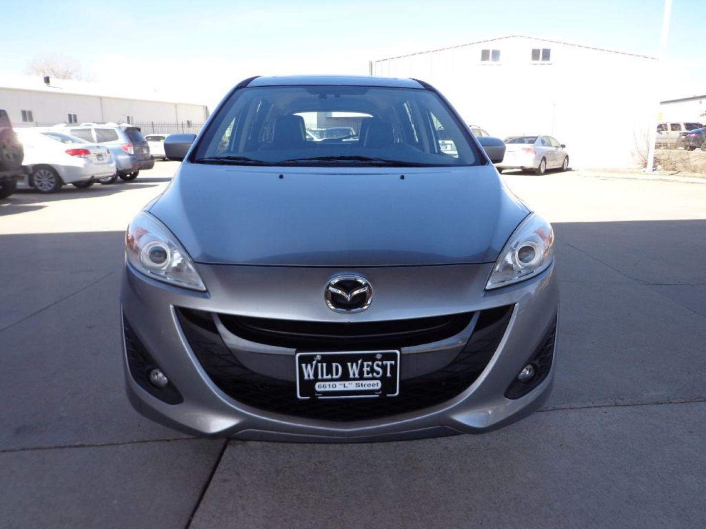 2012 SILVER MAZDA 5 GRAND TOURING (JM1CW2DL4C0) with an 2.5L engine, Automatic transmission, located at 6610 L St., Omaha, NE, 68117, (402) 731-7800, 41.212872, -96.014702 - GRAND TOURING MODEL WITH LOW MILEAGE, CLEAN CARFAX, HEATED LEATHER, 3RD ROW SEATING, SUNROOF AND NEWER TIRES! *****We have found that most customers do the majority of their shopping online before visiting a dealership. For this reason we feel it necessary to have a competitive price on our use - Photo#1