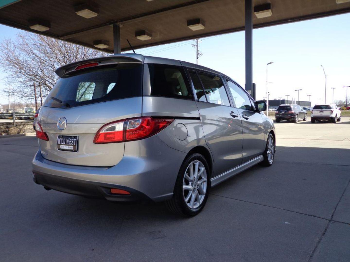 2012 SILVER MAZDA 5 GRAND TOURING (JM1CW2DL4C0) with an 2.5L engine, Automatic transmission, located at 6610 L St., Omaha, NE, 68117, (402) 731-7800, 41.212872, -96.014702 - GRAND TOURING MODEL WITH LOW MILEAGE, CLEAN CARFAX, HEATED LEATHER, 3RD ROW SEATING, SUNROOF AND NEWER TIRES! *****We have found that most customers do the majority of their shopping online before visiting a dealership. For this reason we feel it necessary to have a competitive price on our use - Photo#3