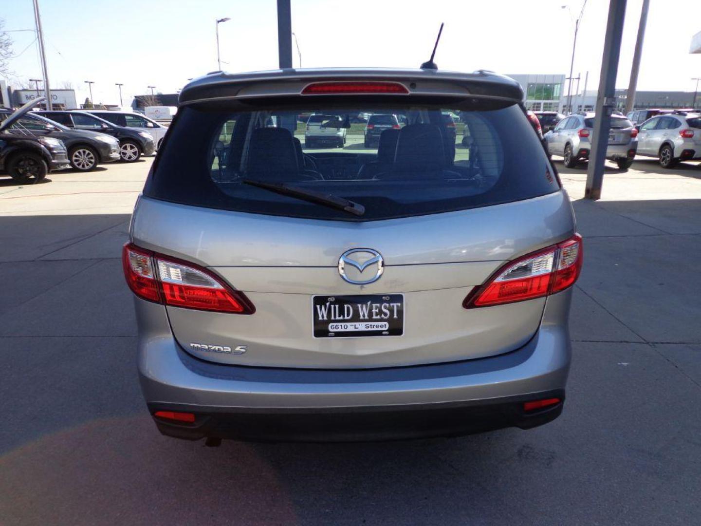 2012 SILVER MAZDA 5 GRAND TOURING (JM1CW2DL4C0) with an 2.5L engine, Automatic transmission, located at 6610 L St., Omaha, NE, 68117, (402) 731-7800, 41.212872, -96.014702 - GRAND TOURING MODEL WITH LOW MILEAGE, CLEAN CARFAX, HEATED LEATHER, 3RD ROW SEATING, SUNROOF AND NEWER TIRES! *****We have found that most customers do the majority of their shopping online before visiting a dealership. For this reason we feel it necessary to have a competitive price on our use - Photo#4