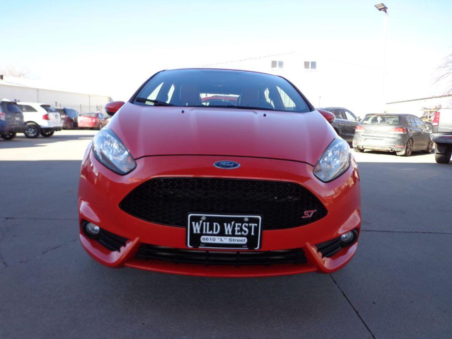 2014 RED FORD FIESTA ST (3FADP4GX6EM) with an 1.6L engine, 6-Speed Manual transmission, located at 6610 L St., Omaha, NE, 68117, (402) 731-7800, 41.212872, -96.014702 - 1-OWNER CLEAN CARFAX LOW MILEAGE LOADED WITH RECARO PACKAGE, SUNROOF, NAV AND NEWER TIRES! *****We have found that most customers do the majority of their shopping online before visiting a dealership. For this reason we feel it necessary to have a competitive price on our used vehicles right u - Photo#1