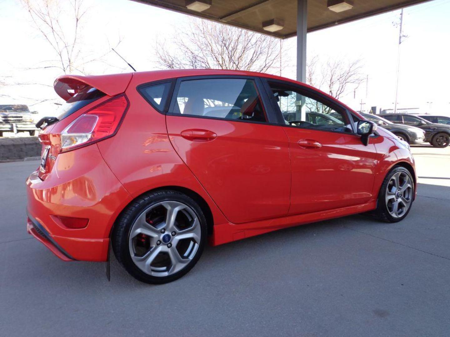 2014 RED FORD FIESTA ST (3FADP4GX6EM) with an 1.6L engine, 6-Speed Manual transmission, located at 6610 L St., Omaha, NE, 68117, (402) 731-7800, 41.212872, -96.014702 - 1-OWNER CLEAN CARFAX LOW MILEAGE LOADED WITH RECARO PACKAGE, SUNROOF, NAV AND NEWER TIRES! *****We have found that most customers do the majority of their shopping online before visiting a dealership. For this reason we feel it necessary to have a competitive price on our used vehicles right u - Photo#3