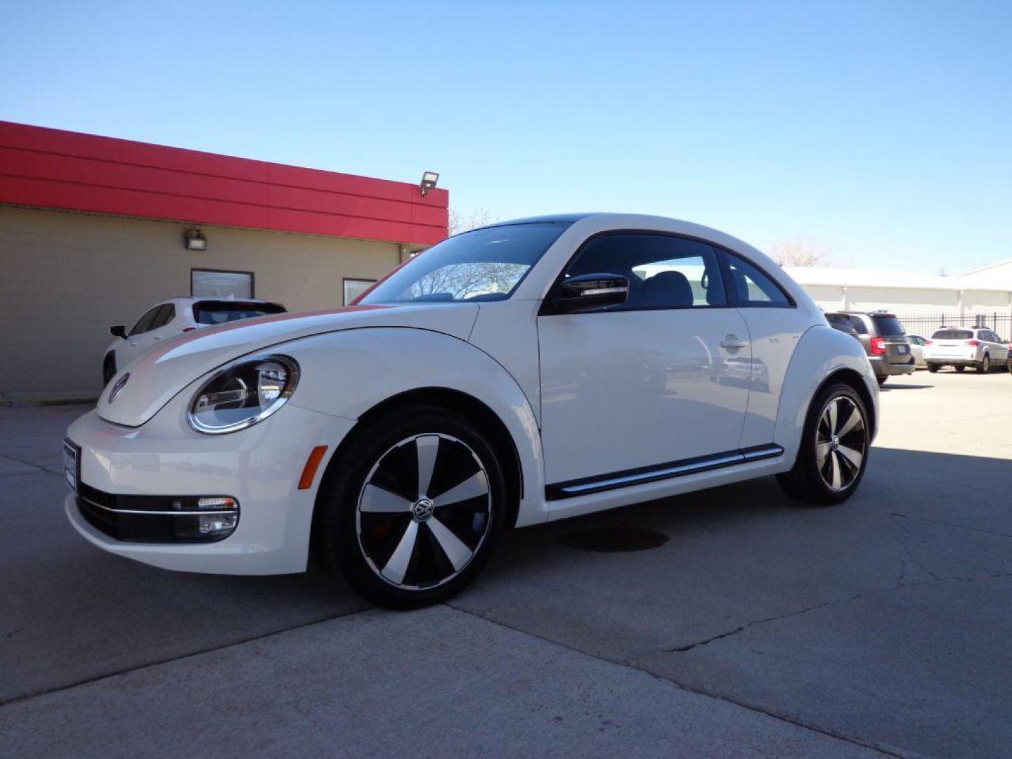 2013 WHITE VOLKSWAGEN BEETLE TURBO (3VWV67AT7DM) with an 2.0L engine, Automatic transmission, located at 6610 L St., Omaha, NE, 68117, (402) 731-7800, 41.212872, -96.014702 - 2-OWNER CLEAN CARFAX LOW MILEAGE WITH A SUNROOF, FENDER AUDIO AND NEWER TIRES! *****We have found that most customers do the majority of their shopping online before visiting a dealership. For this reason we feel it necessary to have a competitive price on our used vehicles right up front. We - Photo#0