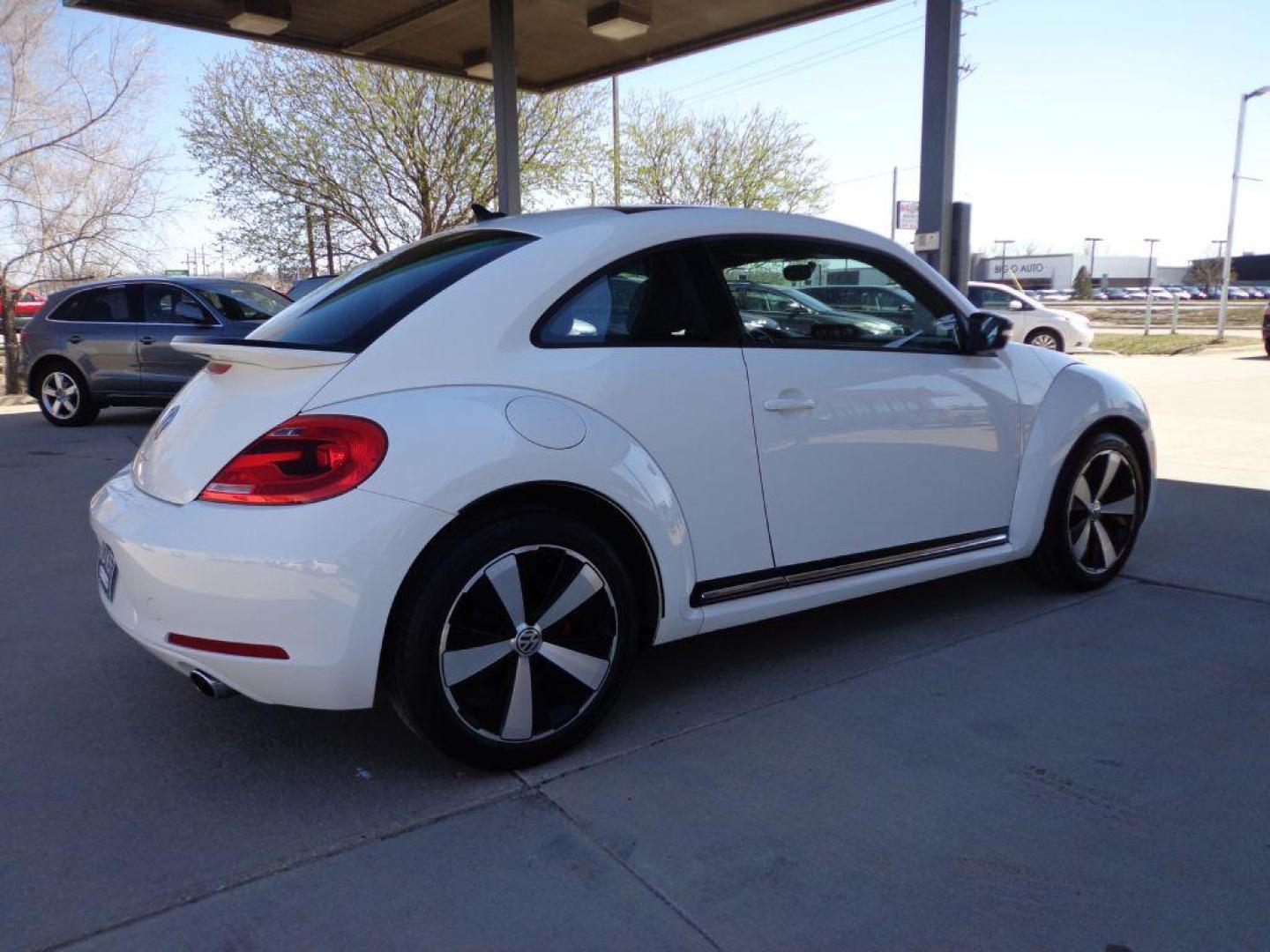 2013 WHITE VOLKSWAGEN BEETLE TURBO (3VWV67AT7DM) with an 2.0L engine, Automatic transmission, located at 6610 L St., Omaha, NE, 68117, (402) 731-7800, 41.212872, -96.014702 - 2-OWNER CLEAN CARFAX LOW MILEAGE WITH A SUNROOF, FENDER AUDIO AND NEWER TIRES! *****We have found that most customers do the majority of their shopping online before visiting a dealership. For this reason we feel it necessary to have a competitive price on our used vehicles right up front. We - Photo#3