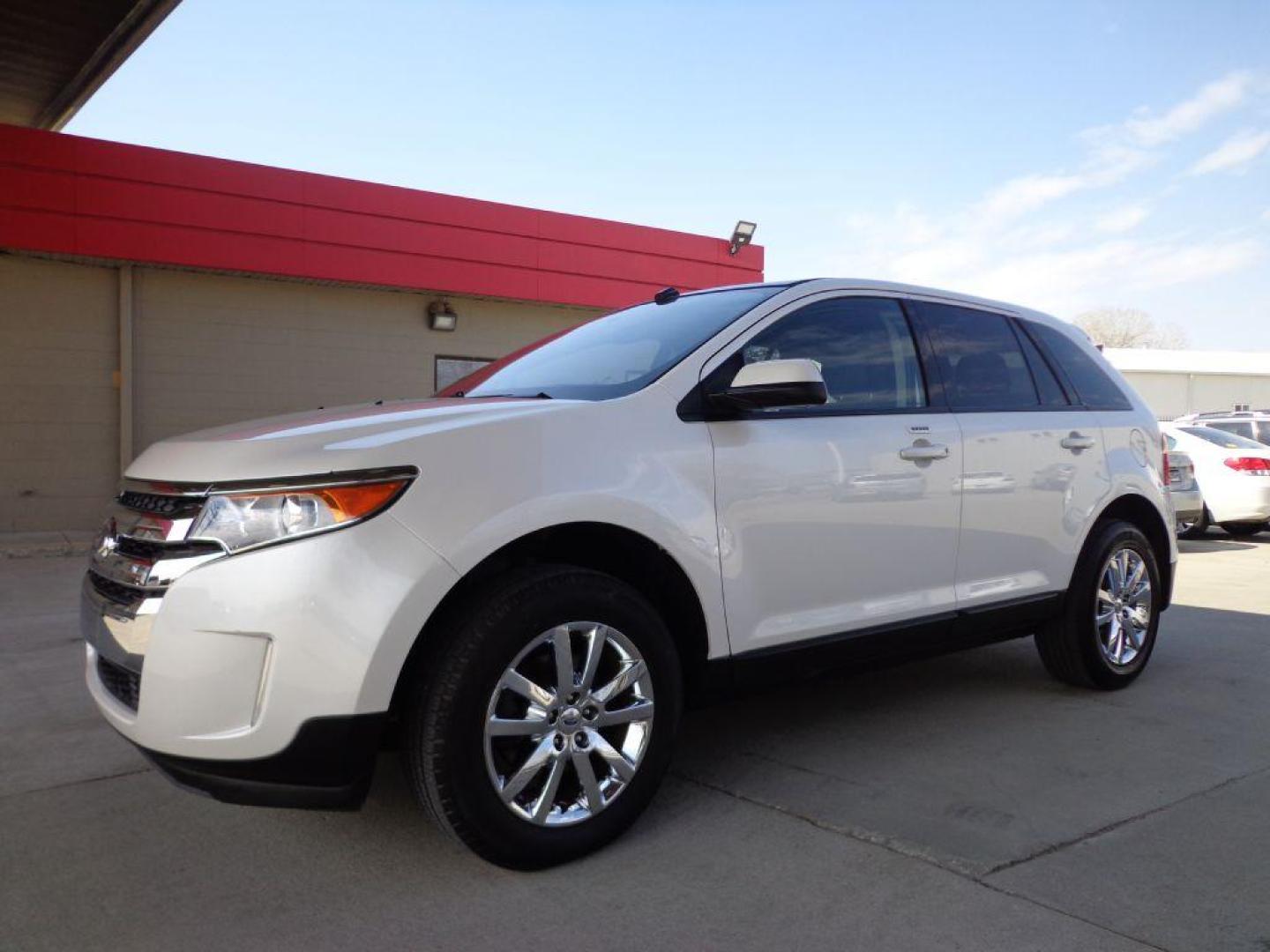 2013 WHITE FORD EDGE SEL (2FMDK4JC3DB) with an 3.5L engine, Automatic transmission, located at 6610 L St., Omaha, NE, 68117, (402) 731-7800, 41.212872, -96.014702 - 1-OWNER CLEAN CARFAX LOW MILEAGE LOADED WITH PANORAMIC SUNROOF, NAV, BACKUP CAM AND NEWER TIRES! *****We have found that most customers do the majority of their shopping online before visiting a dealership. For this reason we feel it necessary to have a competitive price on our used vehicles - Photo#0