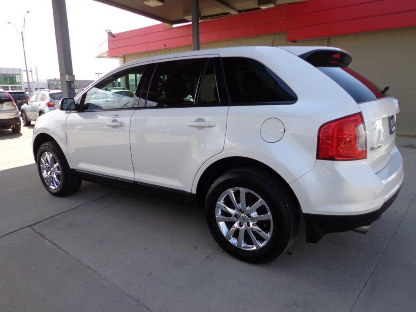 2013 WHITE FORD EDGE SEL (2FMDK4JC3DB) with an 3.5L engine, Automatic transmission, located at 6610 L St., Omaha, NE, 68117, (402) 731-7800, 41.212872, -96.014702 - 1-OWNER CLEAN CARFAX LOW MILEAGE LOADED WITH PANORAMIC SUNROOF, NAV, BACKUP CAM AND NEWER TIRES! *****We have found that most customers do the majority of their shopping online before visiting a dealership. For this reason we feel it necessary to have a competitive price on our used vehicles - Photo#5