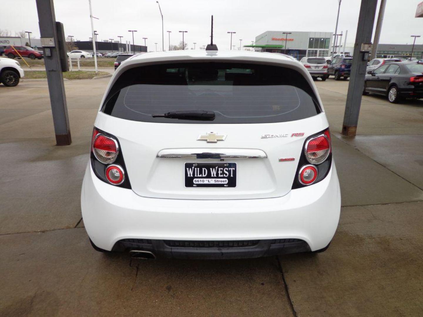 2015 WHITE CHEVROLET SONIC RS (1G1JG6SBXF4) with an 1.4L engine, Automatic transmission, located at 6610 L St., Omaha, NE, 68117, (402) 731-7800, 41.212872, -96.014702 - 1-OWNER CLEAN CARFAX LOW MILEAGE LOADED WITH A SUNROOF, BACKUP CAM AND NEWER TIRES! *****We have found that most customers do the majority of their shopping online before visiting a dealership. For this reason we feel it necessary to have a competitive price on our used vehicles right up front. - Photo#4