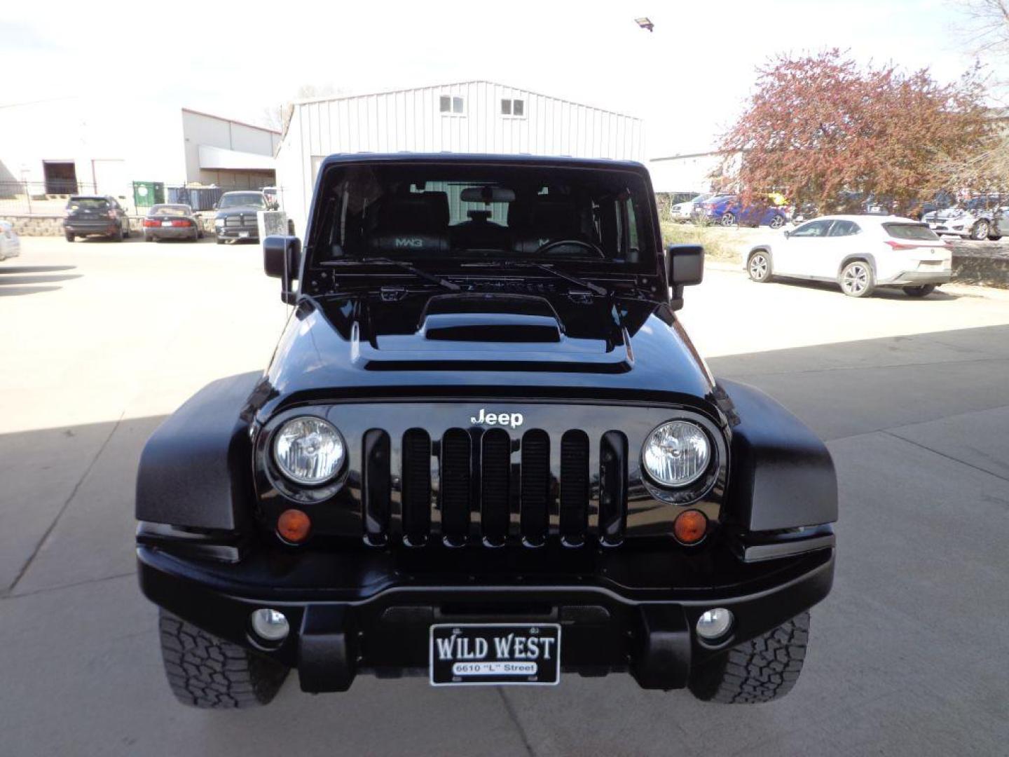 2012 BLACK JEEP WRANGLER RUBICON (1C4BJWCGXCL) with an 3.6L engine, Automatic transmission, located at 6610 L St., Omaha, NE, 68117, (402) 731-7800, 41.212872, -96.014702 - SHARP LOW MILE RUBICON CALL OF DUTY MW3 SPECIAL EDITION WITH A CLEAN CARFAX, LEATHER, NAV, NEWER TIRES AND MUCH MORE! *****We have found that most customers do the majority of their shopping online before visiting a dealership. For this reason we feel it necessary to have a competitive price - Photo#1