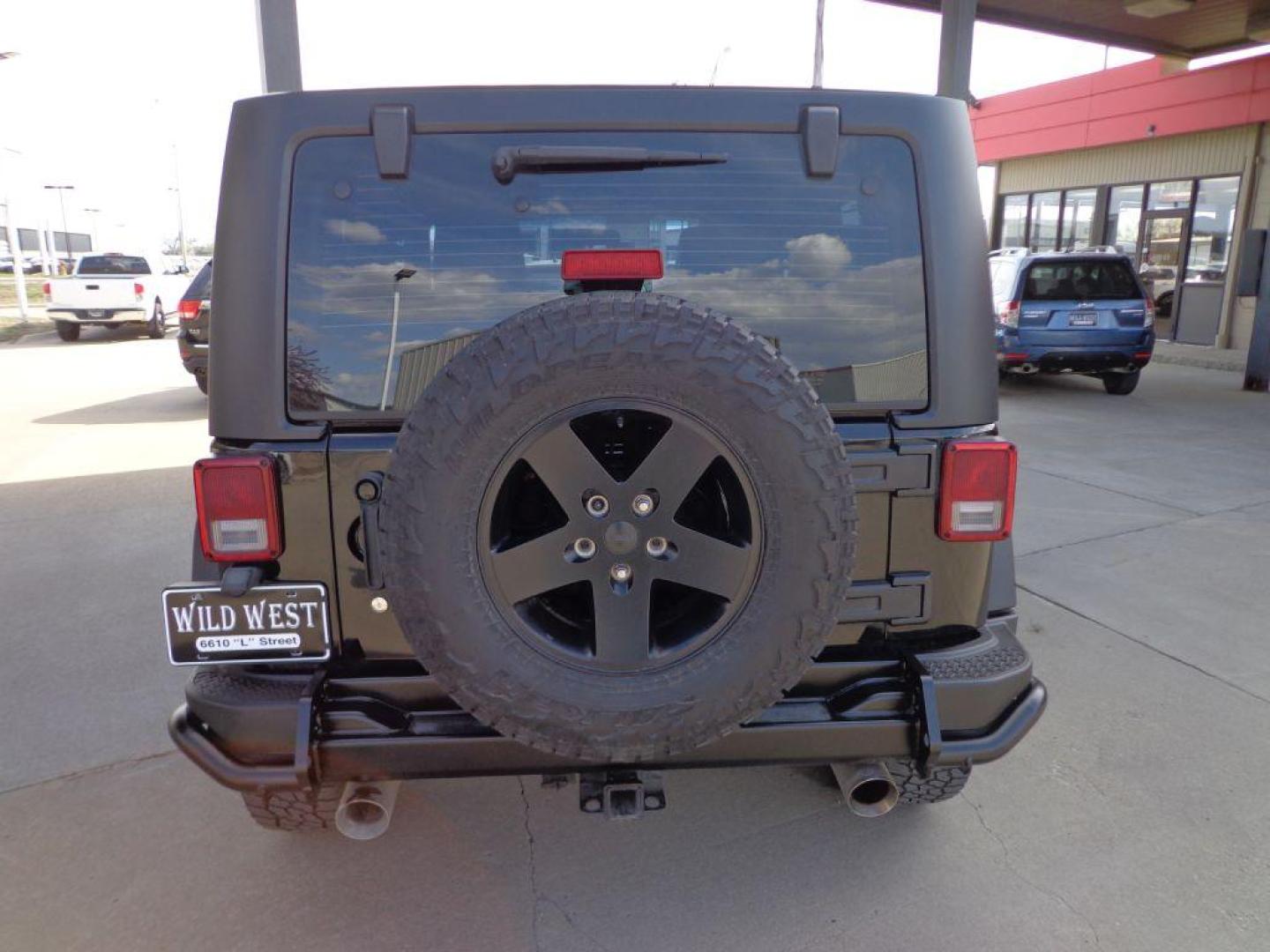 2012 BLACK JEEP WRANGLER RUBICON (1C4BJWCGXCL) with an 3.6L engine, Automatic transmission, located at 6610 L St., Omaha, NE, 68117, (402) 731-7800, 41.212872, -96.014702 - SHARP LOW MILE RUBICON CALL OF DUTY MW3 SPECIAL EDITION WITH A CLEAN CARFAX, LEATHER, NAV, NEWER TIRES AND MUCH MORE! *****We have found that most customers do the majority of their shopping online before visiting a dealership. For this reason we feel it necessary to have a competitive price - Photo#4