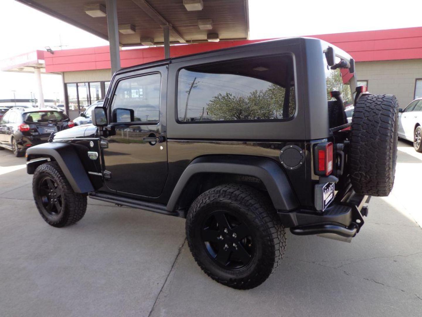 2012 BLACK JEEP WRANGLER RUBICON (1C4BJWCGXCL) with an 3.6L engine, Automatic transmission, located at 6610 L St., Omaha, NE, 68117, (402) 731-7800, 41.212872, -96.014702 - SHARP LOW MILE RUBICON CALL OF DUTY MW3 SPECIAL EDITION WITH A CLEAN CARFAX, LEATHER, NAV, NEWER TIRES AND MUCH MORE! *****We have found that most customers do the majority of their shopping online before visiting a dealership. For this reason we feel it necessary to have a competitive price - Photo#5