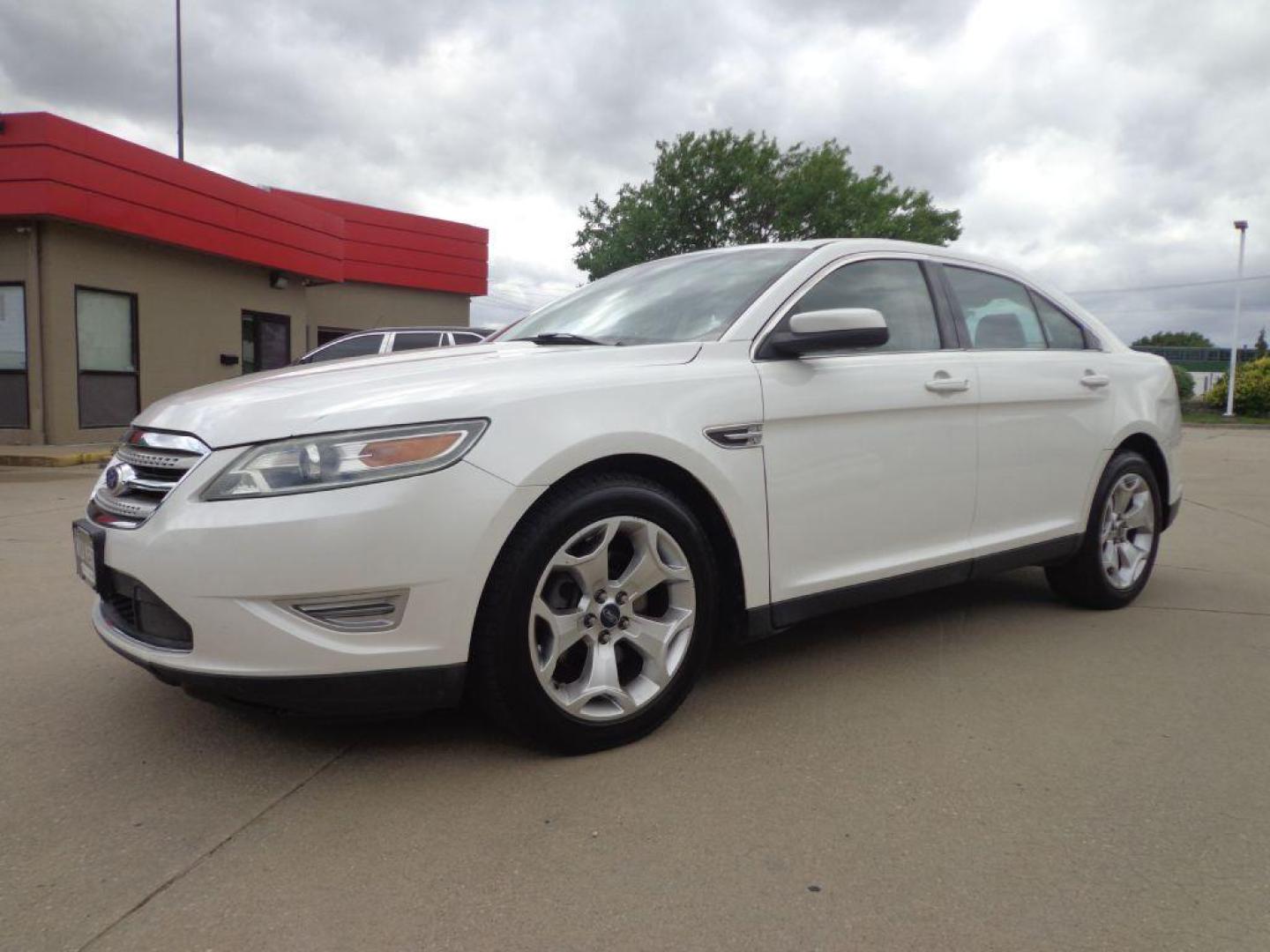 2011 WHITE FORD TAURUS SHO (1FAHP2KT1BG) with an 3.5L engine, Automatic transmission, located at 6610 L St., Omaha, NE, 68117, (402) 731-7800, 41.212872, -96.014702 - FRESH TRADE-IN, PRE-INSPECTED, LOADED WITH OPTIONS AND NEWER TIRES! *****We have found that most customers do the majority of their shopping online before visiting a dealership. For this reason we feel it necessary to have a competitive price on our used vehicles right up front. We spend time - Photo#0