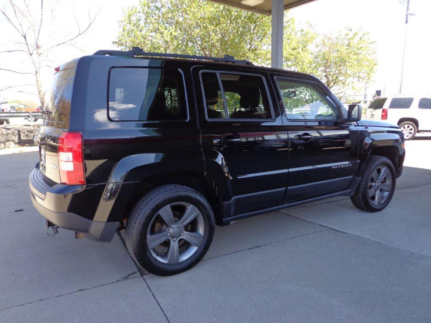 2015 BLACK JEEP PATRIOT LATITUDE (1C4NJRFB0FD) with an 2.4L engine, Continuously Variable transmission, located at 6610 L St., Omaha, NE, 68117, (402) 731-7800, 41.212872, -96.014702 - 2-OWNER, CLEAN CARFAX WITH HIGH ALTITUDE PACKAGE, HEATED LEATHER, SUNROOF AND MUCH MORE! *****We have found that most customers do the majority of their shopping online before visiting a dealership. For this reason we feel it necessary to have a competitive price on our used vehicles right u - Photo#3