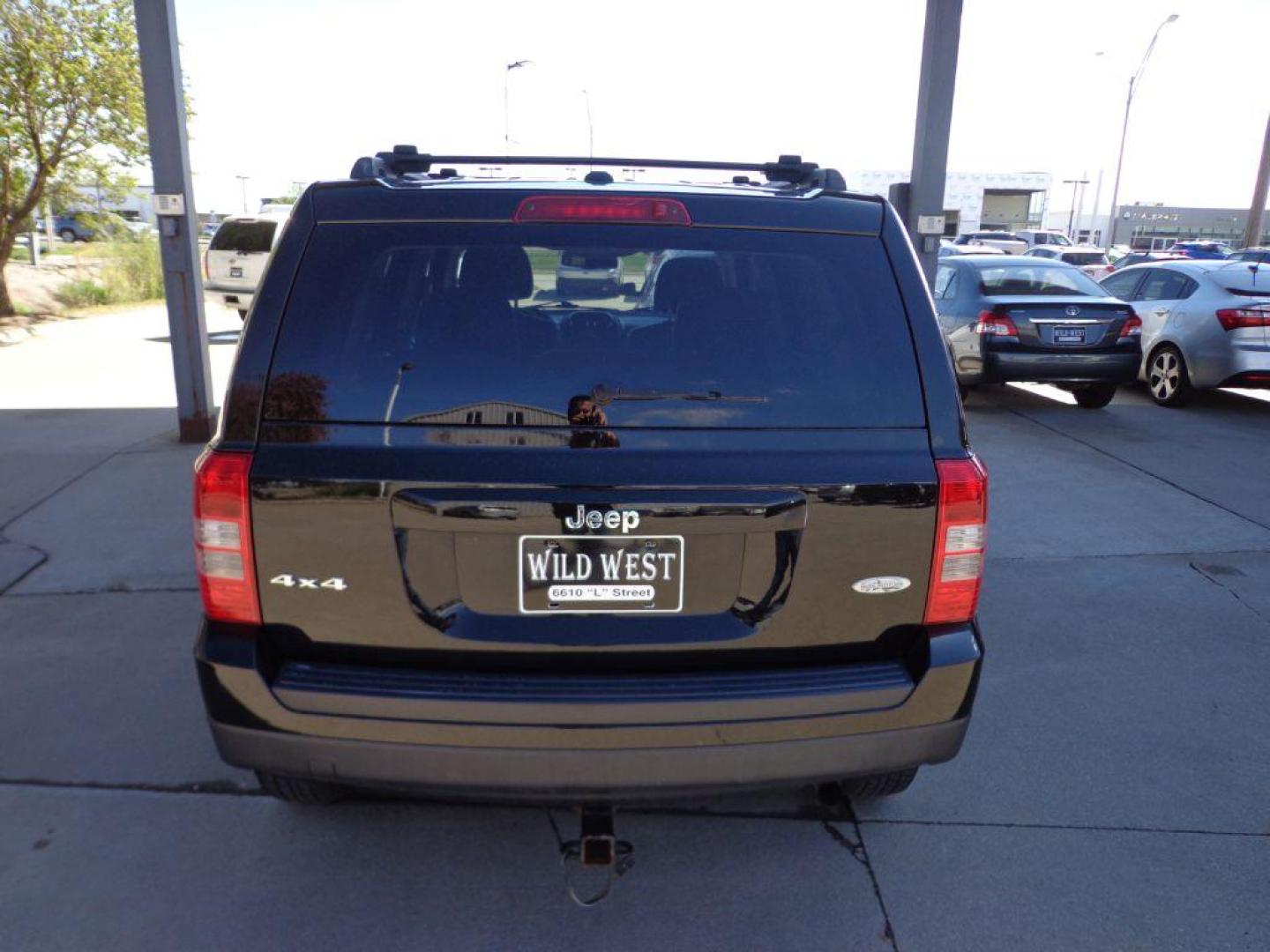 2015 BLACK JEEP PATRIOT LATITUDE (1C4NJRFB0FD) with an 2.4L engine, Continuously Variable transmission, located at 6610 L St., Omaha, NE, 68117, (402) 731-7800, 41.212872, -96.014702 - 2-OWNER, CLEAN CARFAX WITH HIGH ALTITUDE PACKAGE, HEATED LEATHER, SUNROOF AND MUCH MORE! *****We have found that most customers do the majority of their shopping online before visiting a dealership. For this reason we feel it necessary to have a competitive price on our used vehicles right u - Photo#4