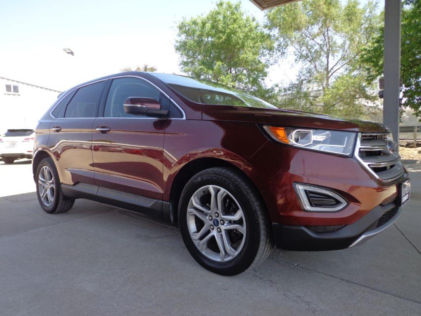 2015 BROWN FORD EDGE TITANIUM (2FMTK4K87FB) with an 3.5L engine, Automatic transmission, located at 6610 L St., Omaha, NE, 68117, (402) 731-7800, 41.212872, -96.014702 - 1-OWNER CLEAN CARFAX LOW MILEAGE LOADED WITH PANORAMIC ROOF, HEATED/COOLED FRONT SEATS, HEATED REAR SEATS, BLIND SPOT MONITORING, REMOTE START, NAV, BACKUP CAM, POWER LIFTGATE, ALL WEATHER MATS AND MUCH MORE! *****We have found that most customers do the majority of their shopping online before - Photo#2