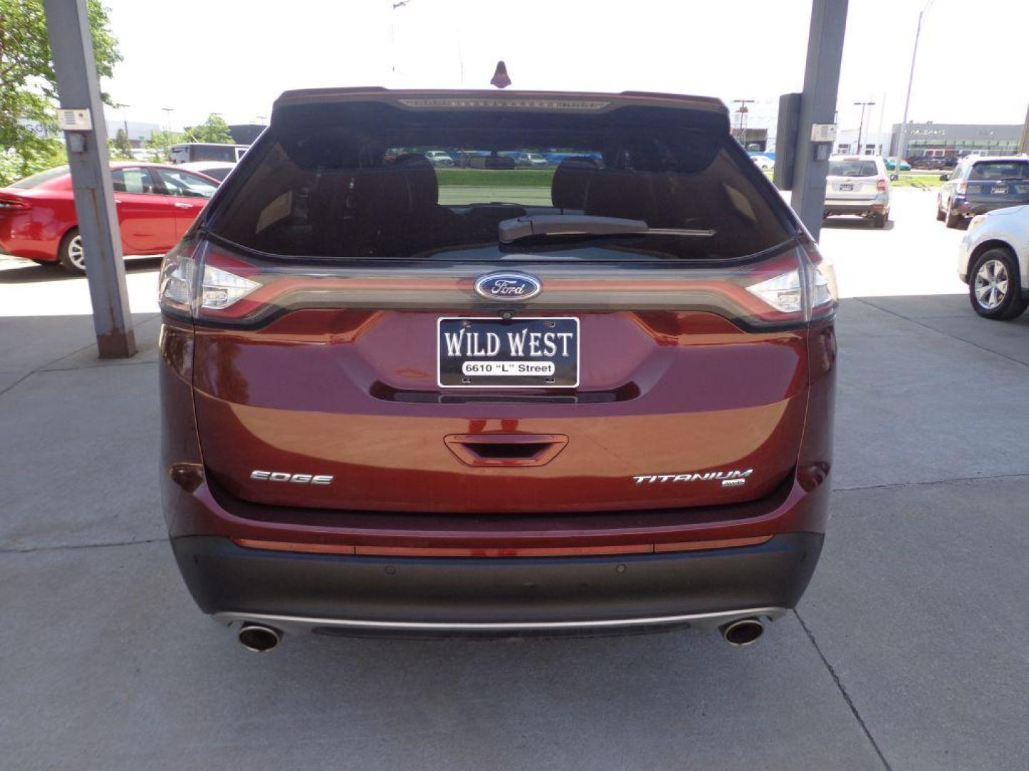 2015 BROWN FORD EDGE TITANIUM (2FMTK4K87FB) with an 3.5L engine, Automatic transmission, located at 6610 L St., Omaha, NE, 68117, (402) 731-7800, 41.212872, -96.014702 - 1-OWNER CLEAN CARFAX LOW MILEAGE LOADED WITH PANORAMIC ROOF, HEATED/COOLED FRONT SEATS, HEATED REAR SEATS, BLIND SPOT MONITORING, REMOTE START, NAV, BACKUP CAM, POWER LIFTGATE, ALL WEATHER MATS AND MUCH MORE! *****We have found that most customers do the majority of their shopping online before - Photo#4