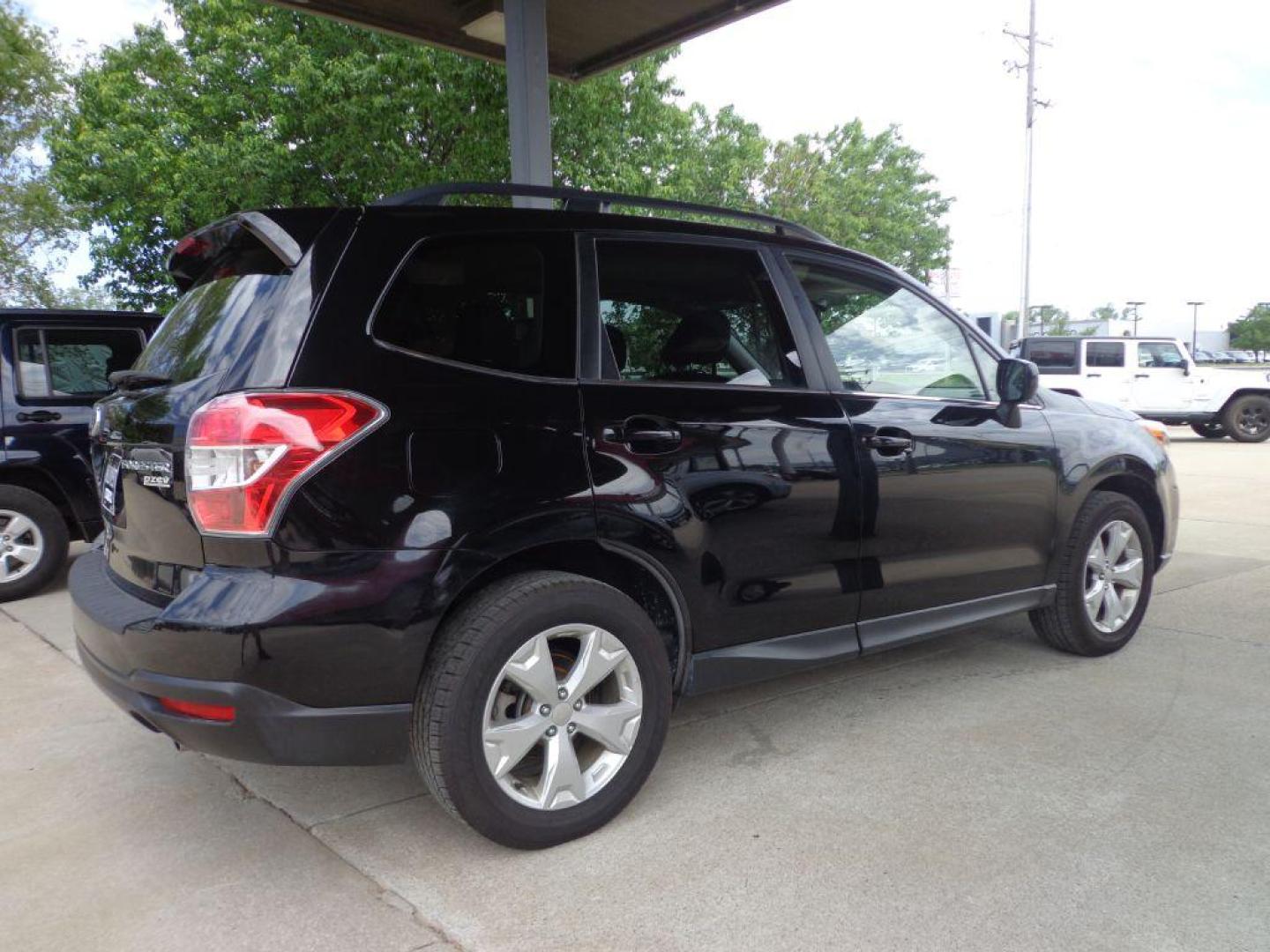 2015 BLACK SUBARU FORESTER 2.5I LIMITED (JF2SJAKC9FH) with an 2.5L engine, Continuously Variable transmission, located at 6610 L St., Omaha, NE, 68117, (402) 731-7800, 41.212872, -96.014702 - Photo#3