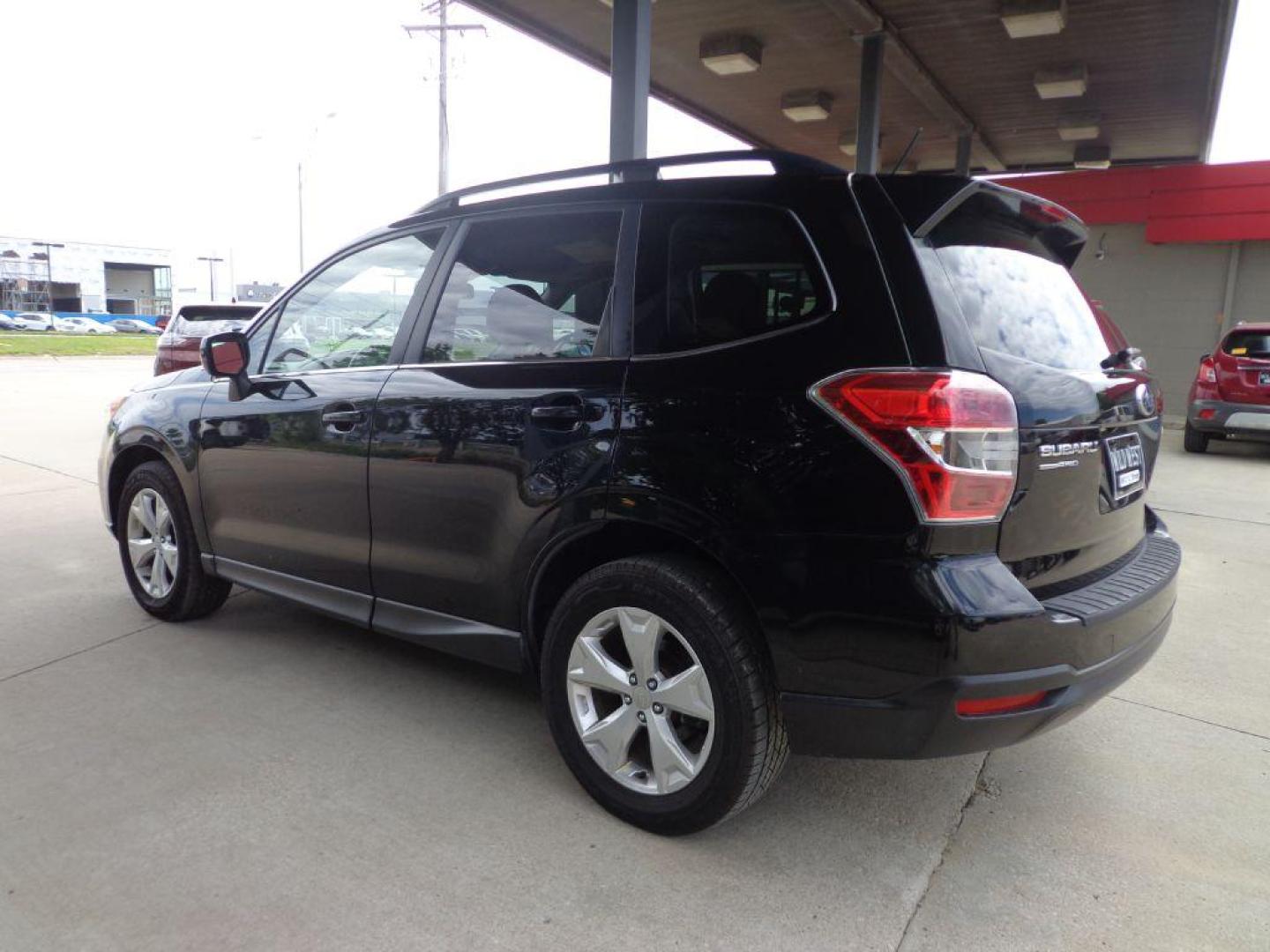 2015 BLACK SUBARU FORESTER 2.5I LIMITED (JF2SJAKC9FH) with an 2.5L engine, Continuously Variable transmission, located at 6610 L St., Omaha, NE, 68117, (402) 731-7800, 41.212872, -96.014702 - Photo#5