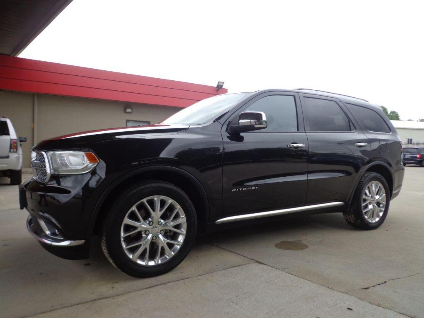 2015 BLACK DODGE DURANGO CITADEL (1C4SDJET7FC) with an 5.7L engine, Automatic transmission, located at 6610 L St., Omaha, NE, 68117, (402) 731-7800, 41.212872, -96.014702 - 1-OWNER CLEAN CARFAX LOW MILEAGE LOADED WITH HEATED/COOLED FROMT SEATS, HEATED REAR SEATS, THIRD ROW SEAT, REAR ENTERTAINMENT, SUNROOF, NAV, BACKUP CAM, ADAPTIVE CRUISE, BLIND SPOT/CROSS PATH DETECTION, FRONT COLLISION WARNING AND NEWER TIRES! *****We have found that most customers do the maj - Photo#0