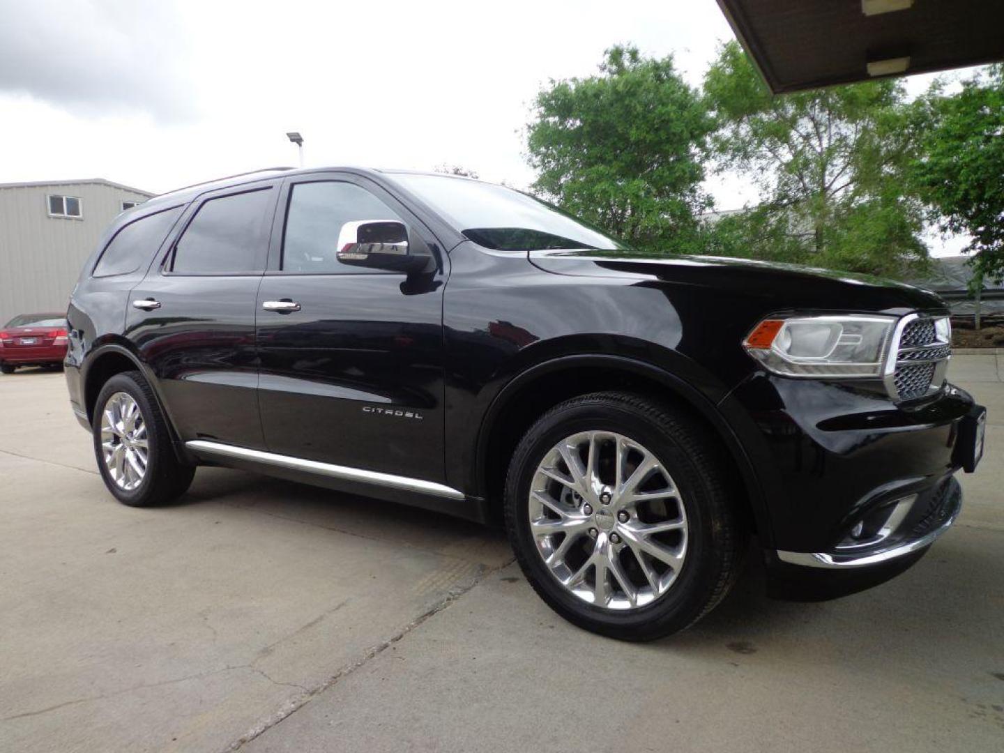 2015 BLACK DODGE DURANGO CITADEL (1C4SDJET7FC) with an 5.7L engine, Automatic transmission, located at 6610 L St., Omaha, NE, 68117, (402) 731-7800, 41.212872, -96.014702 - 1-OWNER CLEAN CARFAX LOW MILEAGE LOADED WITH HEATED/COOLED FROMT SEATS, HEATED REAR SEATS, THIRD ROW SEAT, REAR ENTERTAINMENT, SUNROOF, NAV, BACKUP CAM, ADAPTIVE CRUISE, BLIND SPOT/CROSS PATH DETECTION, FRONT COLLISION WARNING AND NEWER TIRES! *****We have found that most customers do the maj - Photo#2