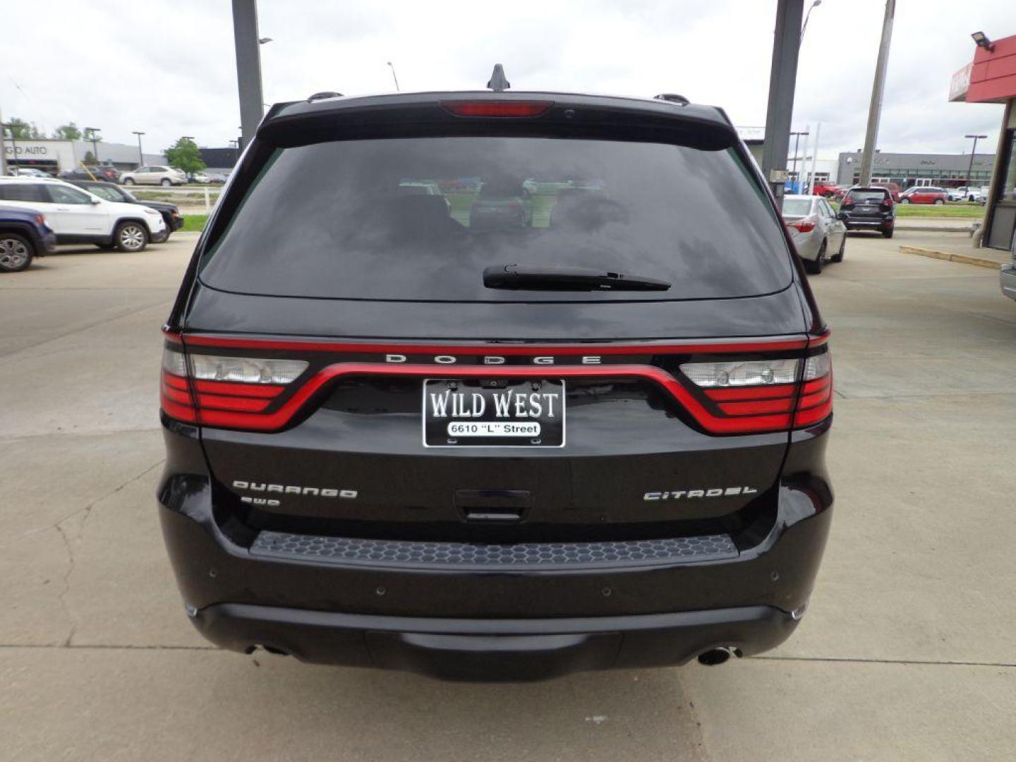 2015 BLACK DODGE DURANGO CITADEL (1C4SDJET7FC) with an 5.7L engine, Automatic transmission, located at 6610 L St., Omaha, NE, 68117, (402) 731-7800, 41.212872, -96.014702 - 1-OWNER CLEAN CARFAX LOW MILEAGE LOADED WITH HEATED/COOLED FROMT SEATS, HEATED REAR SEATS, THIRD ROW SEAT, REAR ENTERTAINMENT, SUNROOF, NAV, BACKUP CAM, ADAPTIVE CRUISE, BLIND SPOT/CROSS PATH DETECTION, FRONT COLLISION WARNING AND NEWER TIRES! *****We have found that most customers do the maj - Photo#4