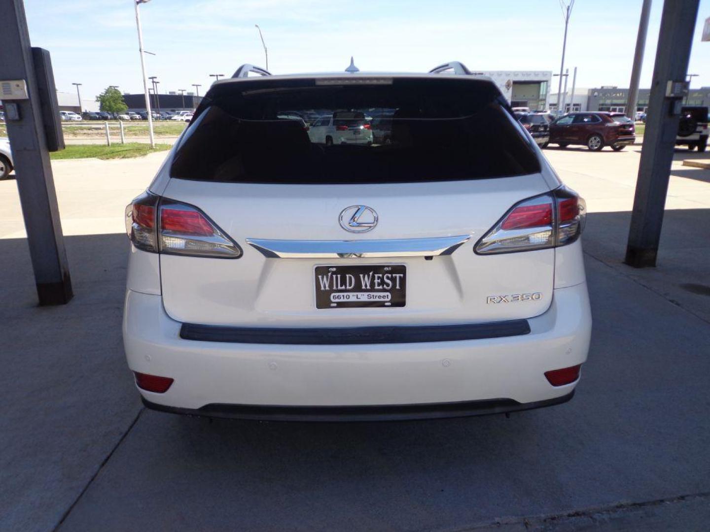 2013 WHITE LEXUS RX 350 BASE (2T2BK1BA8DC) with an 3.5L engine, Automatic transmission, located at 6610 L St., Omaha, NE, 68117, (402) 731-7800, 41.212872, -96.014702 - 2-OWNER CLEAN CARFAX , LOW MILEAGE LOADED WITH HEATED/COOLED SEATS, BACKUP CAM, NAV, SUNROOF AND MUCH MORE! *****We have found that most customers do the majority of their shopping online before visiting a dealership. For this reason we feel it necessary to have a competitive price on our used - Photo#4