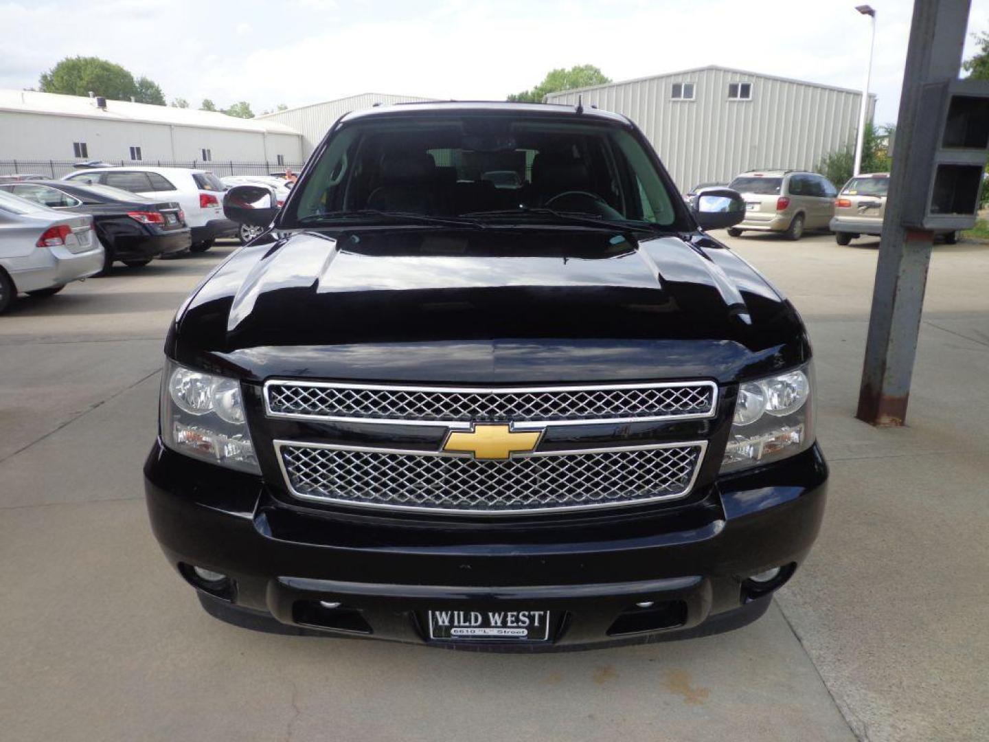 2014 BLACK CHEVROLET SUBURBAN 1500 LTZ (1GNSKKE71ER) with an 5.3L engine, Automatic transmission, located at 6610 L St., Omaha, NE, 68117, (402) 731-7800, 41.212872, -96.014702 - Photo#1