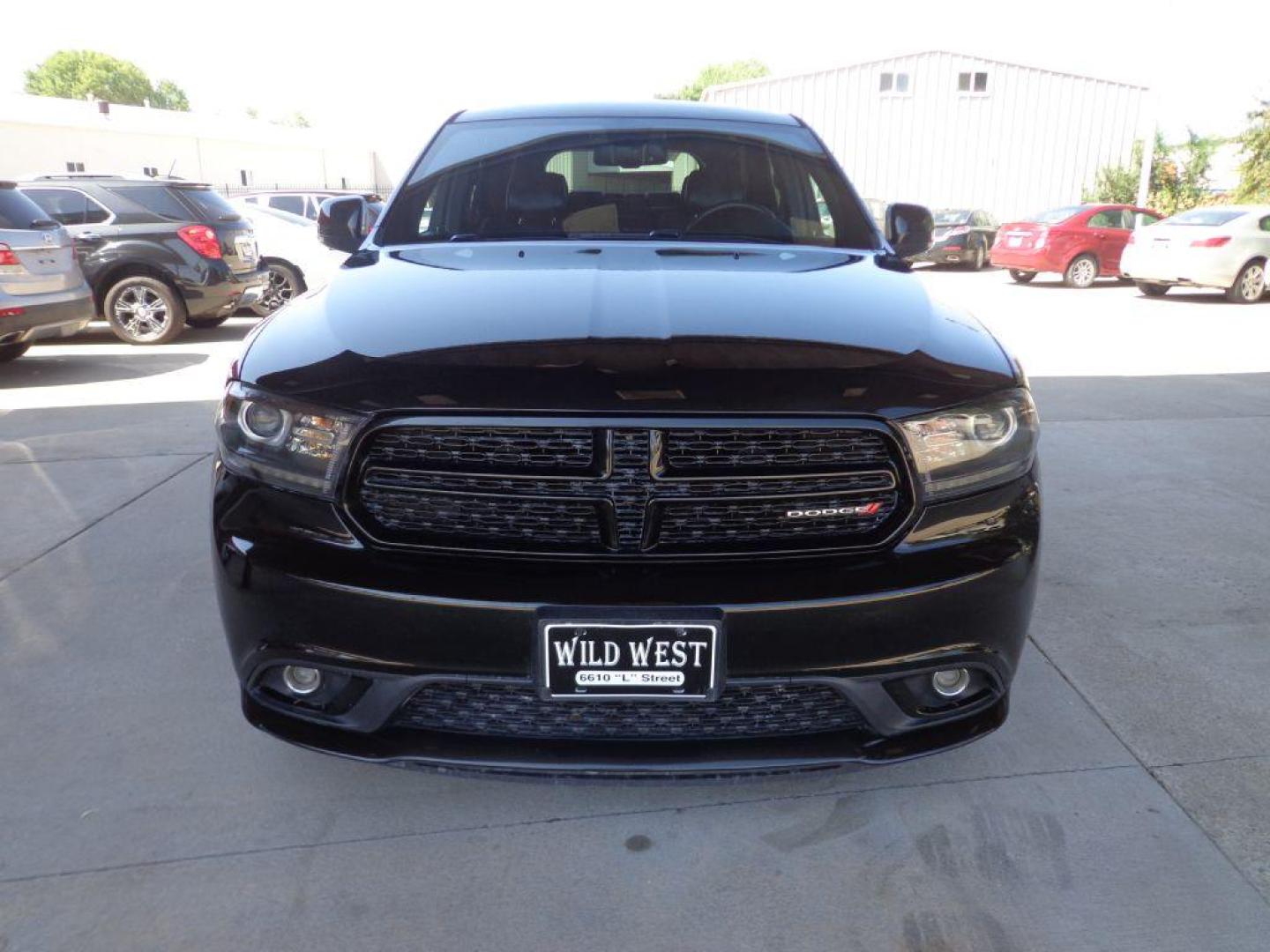 2015 BLACK DODGE DURANGO LIMITED (1C4RDJDG4FC) with an 3.6L engine, Automatic transmission, located at 6610 L St., Omaha, NE, 68117, (402) 731-7800, 41.212872, -96.014702 - 2-OWNER CLEAN CARFAX WITH LOW MILEAGE LOADED WITH SUNROOF, NAV, BEATS AUDIO, NEWER TIRES AND MUCH MORE! *****We have found that most customers do the majority of their shopping online before visiting a dealership. For this reason we feel it necessary to have a competitive price on our used vehi - Photo#1