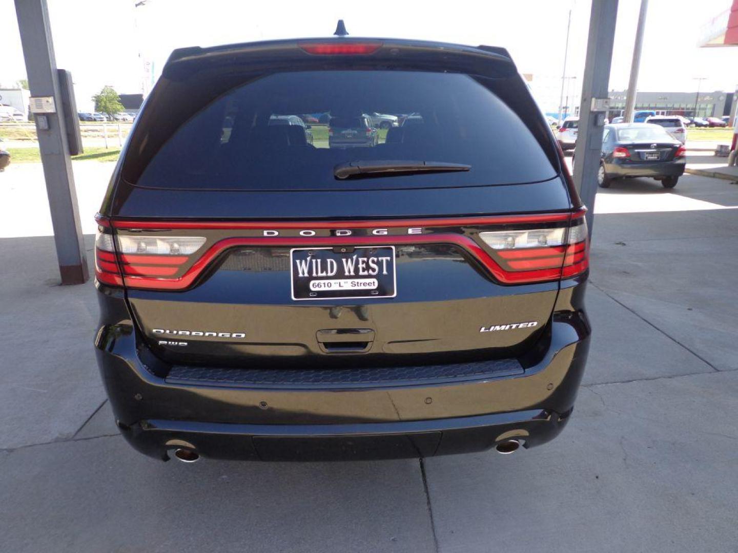 2015 BLACK DODGE DURANGO LIMITED (1C4RDJDG4FC) with an 3.6L engine, Automatic transmission, located at 6610 L St., Omaha, NE, 68117, (402) 731-7800, 41.212872, -96.014702 - 2-OWNER CLEAN CARFAX WITH LOW MILEAGE LOADED WITH SUNROOF, NAV, BEATS AUDIO, NEWER TIRES AND MUCH MORE! *****We have found that most customers do the majority of their shopping online before visiting a dealership. For this reason we feel it necessary to have a competitive price on our used vehi - Photo#4