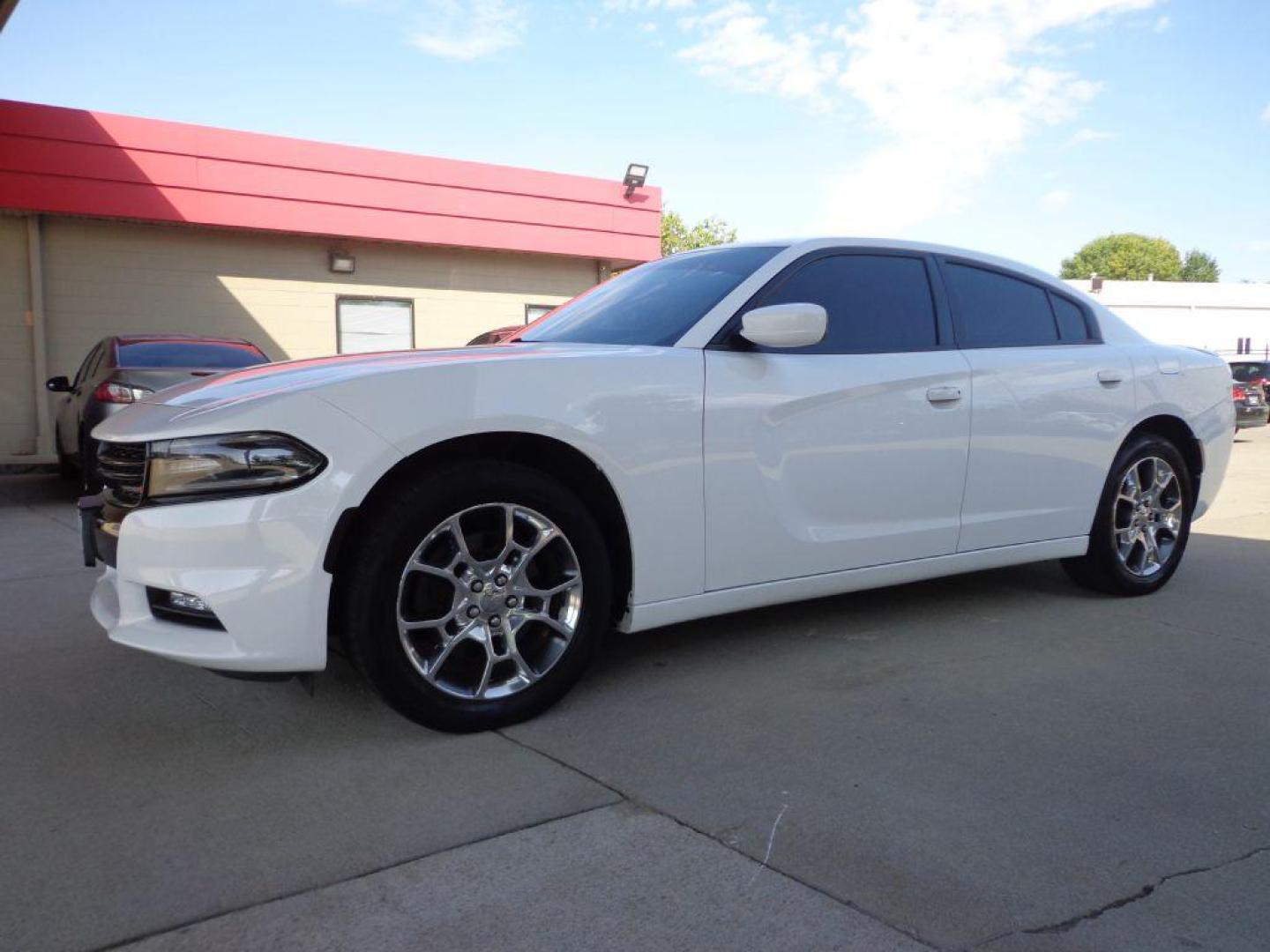 2016 WHITE DODGE CHARGER SXT (2C3CDXJG6GH) with an 3.6L engine, Automatic transmission, located at 6610 L St., Omaha, NE, 68117, (402) 731-7800, 41.212872, -96.014702 - 2-OWNER, CLEAN CARFAX, LOW MILEAGE, SXT PLUS AWD PACKAGE LOADED WITH OPTIONS AND NEWER TIRES! *****We have found that most customers do the majority of their shopping online before visiting a dealership. For this reason we feel it necessary to have a competitive price on our used vehicles right - Photo#0