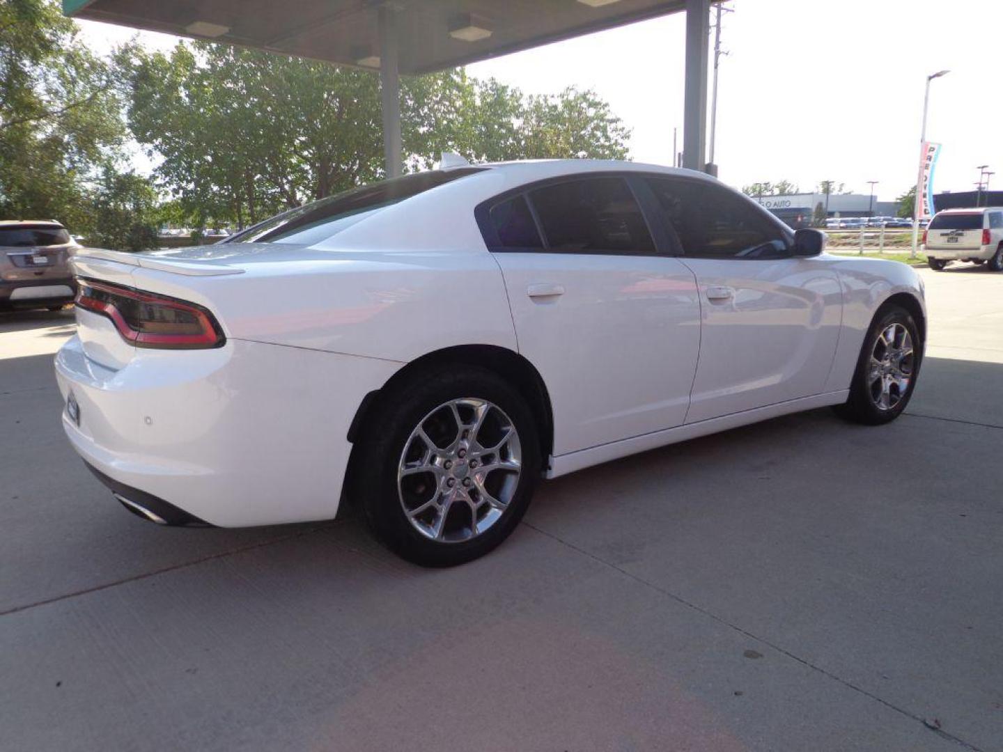 2016 WHITE DODGE CHARGER SXT (2C3CDXJG6GH) with an 3.6L engine, Automatic transmission, located at 6610 L St., Omaha, NE, 68117, (402) 731-7800, 41.212872, -96.014702 - 2-OWNER, CLEAN CARFAX, LOW MILEAGE, SXT PLUS AWD PACKAGE LOADED WITH OPTIONS AND NEWER TIRES! *****We have found that most customers do the majority of their shopping online before visiting a dealership. For this reason we feel it necessary to have a competitive price on our used vehicles right - Photo#3