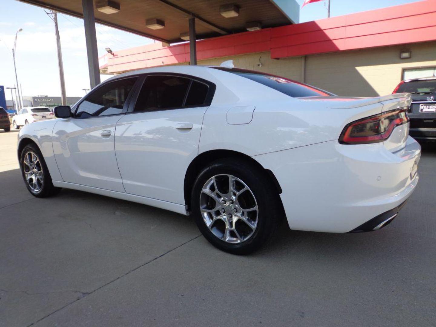 2016 WHITE DODGE CHARGER SXT (2C3CDXJG6GH) with an 3.6L engine, Automatic transmission, located at 6610 L St., Omaha, NE, 68117, (402) 731-7800, 41.212872, -96.014702 - 2-OWNER, CLEAN CARFAX, LOW MILEAGE, SXT PLUS AWD PACKAGE LOADED WITH OPTIONS AND NEWER TIRES! *****We have found that most customers do the majority of their shopping online before visiting a dealership. For this reason we feel it necessary to have a competitive price on our used vehicles right - Photo#5